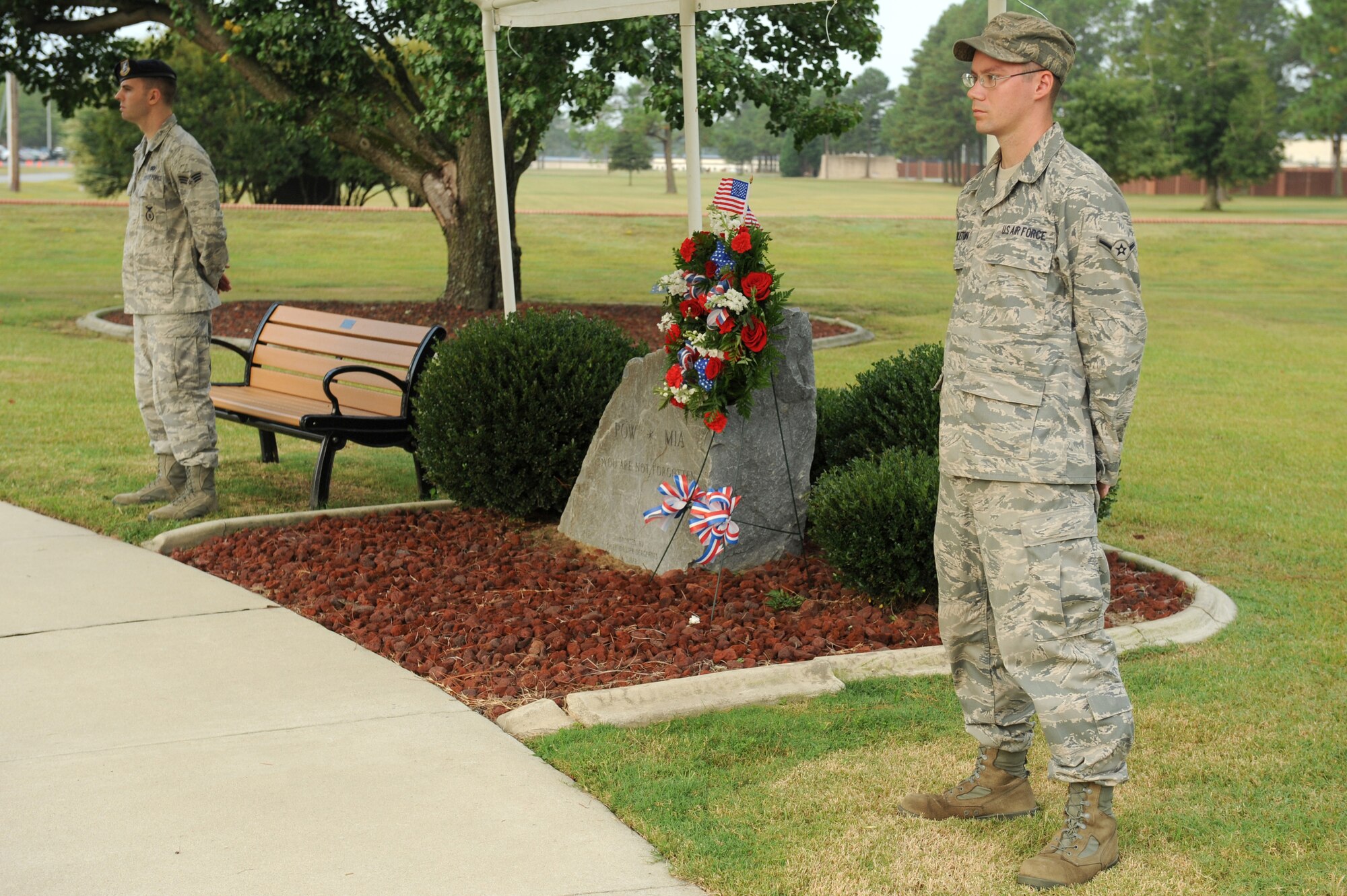 Senior Airman Forrest George, 4th Security Forces Squadron patrolman, and Airman Joshua Middleton, 4th Logistic Readiness Squadron vehicle operator, stands vigil at Heritage Park in honor of National Prisoner of War – Missing in Action Recognition Day on Seymour Johnson Air Force Base, N.C., Sept. 18, 2009. National POW/MIA Recognition Day is observed each year on the third Friday of September to honor the sacrifices made by prisoners of war and those who are still missing in action. (U.S. Air Force photo by Airman 1st Class Whitney Lambert)