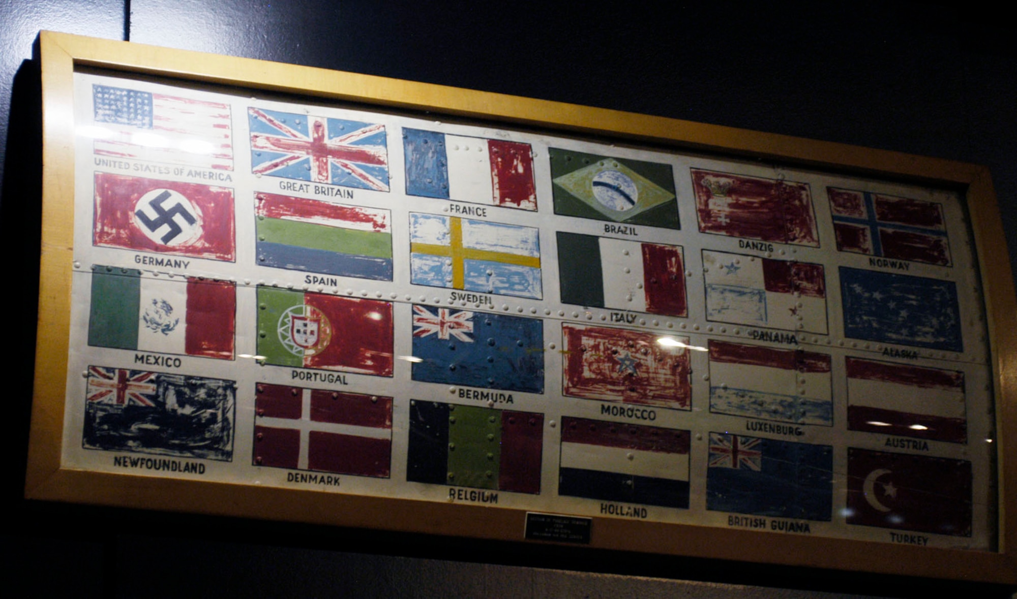 DAYTON, Ohio -- This section of B-17G fuselage, with flags of the various nations over which it had flown during World War II, is on display in the World War II Gallery at the National Museum of the U.S. Air Force. Donated by Mr. Milton Caniff, Palm Springs, Calif. (U.S. Air Force photo)