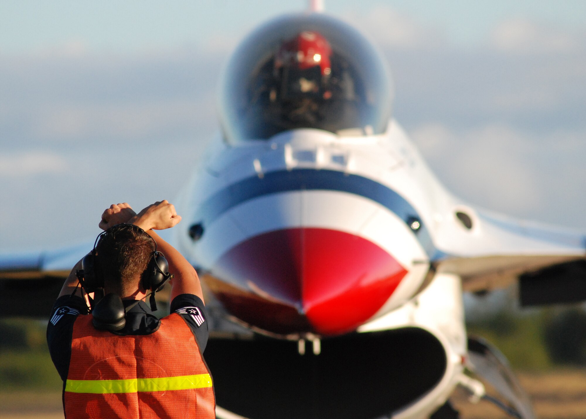 HICKAM AIR FORCE BASE, Hawaii -- The Thunderbirds, U.S. Air Force Demonstration Squadron, arrive in typical style over Hickam Air Force Base, Hawaii, during their initial arrival for "Wings Over the Pacific," Sept. 16. The Thunderbirds will demonstrate the capabilities the F-16 Fighting Falcon by performing combat maneuvers during their aerial portion of the weekend event Sept. 19-20. This is Hickam?s first open house since 2003, and a crowd of more than 120,000 are expected to visit during the weekend.  (U.S. Air Force photo/Staff Sgt. Mike Meares)