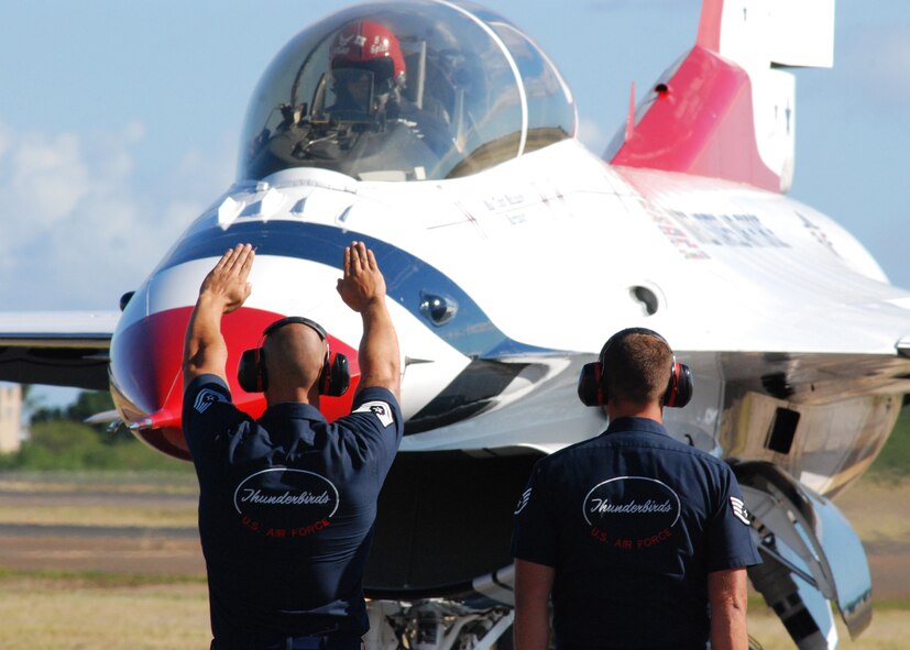 HICKAM AIR FORCE BASE, Hawaii -- The Thunderbirds, U.S. Air Force Demonstration Squadron, arrive in typical style over Hickam Air Force Base, Hawaii, during their initial arrival for "Wings Over the Pacific," Sept. 16. The Thunderbirds will demonstrate the capabilities the F-16 Fighting Falcon by performing combat maneuvers during their aerial portion of the weekend event Sept. 19-20. This is Hickam?s first open house since 2003, and a crowd of more than 120,000 are expected to visit during the weekend.  (U.S. Air Force photo/Staff Sgt. Mike Meares)