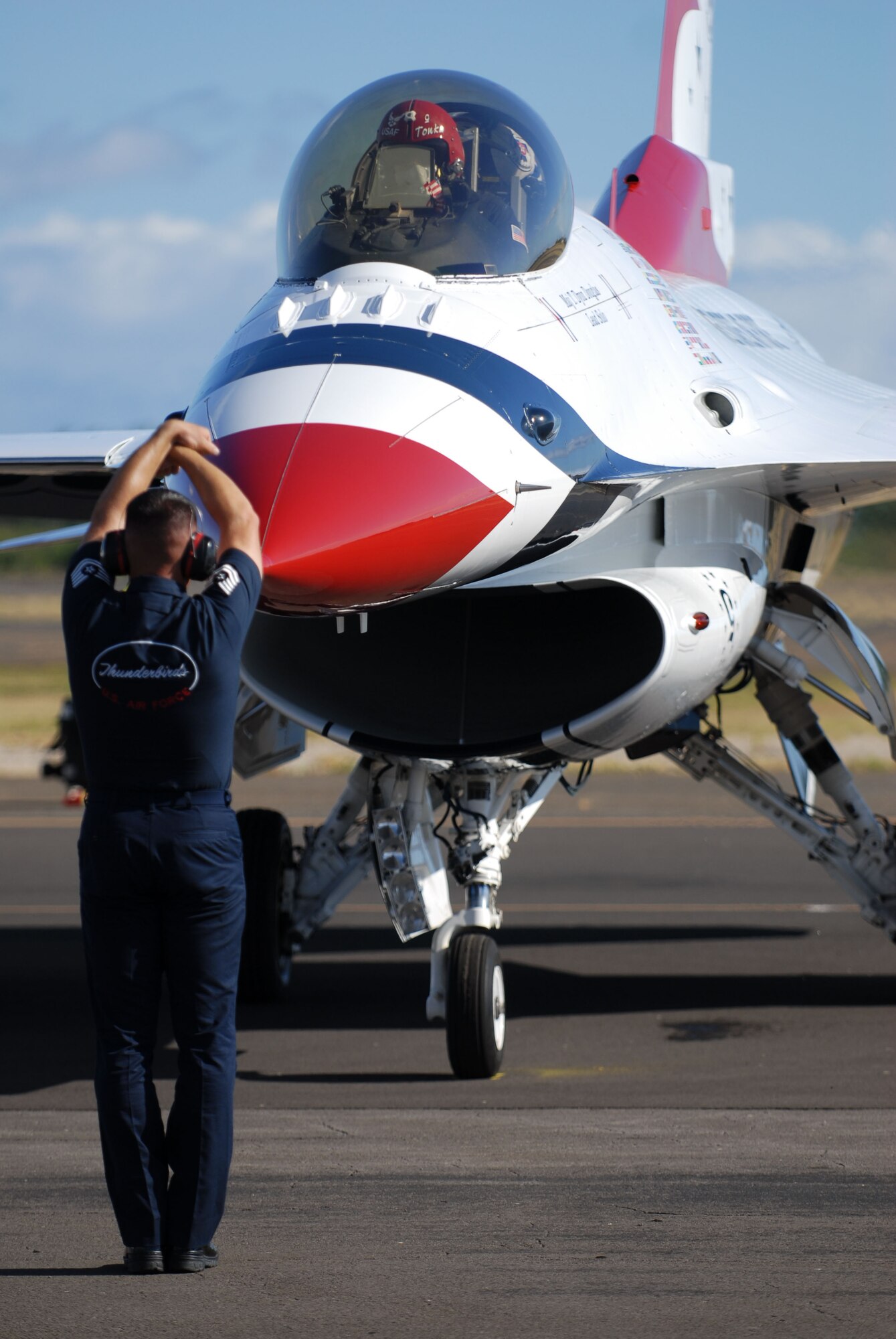 HICKAM AIR FORCE BASE, Hawaii -- A U.S. Air Force Demonstration Squadron F-16 Thunderbird arrives for Open House "Wings over the Pacific" here, Sept. 16. The Open House will feature live band performances, static displays and The Thunderbirds will demonstrate the capabilities the F-16 Fighting Falcon when they preform an air show. (U.S. Air Force photo/Senior Airman Gustavo Gonzalez)