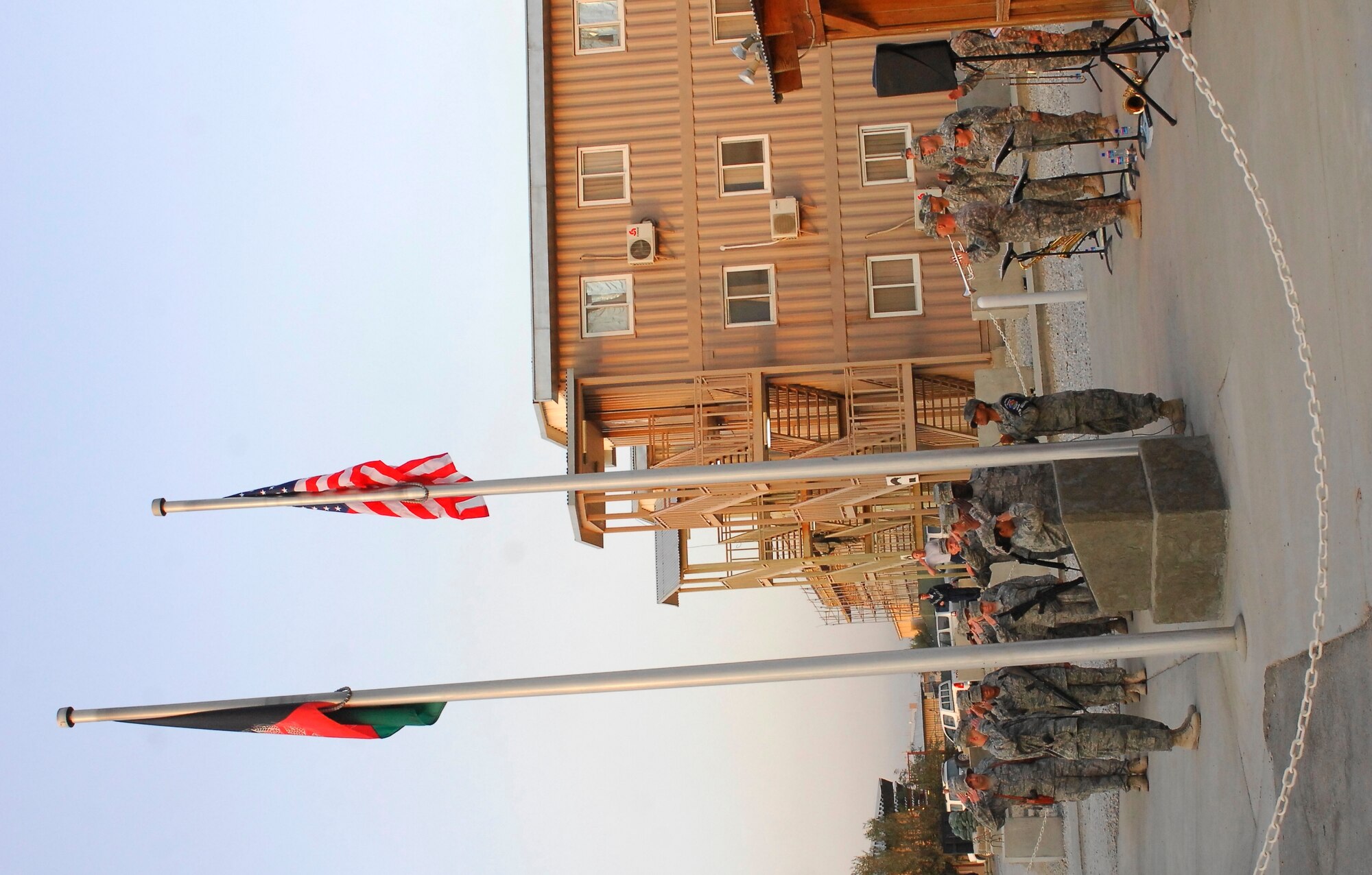 BAGRAM AIRFIELD, Afghanistan -- The Bagram Airfield Base Honor Guard raise the American flag on the 62nd Air Force Birthday here Sept. 18, 2009. The event was held at Camp Cunningham, where most Airmen here live and work. The camp is named after pararescueman Senior Airman Jason D. Cunningham, who gave his life in Afghanistan, in March 2002, saving 10 lives and making it possible for seven others who were killed to come home. (U.S. Air Force photo/Senior Airman Felicia Juenke)