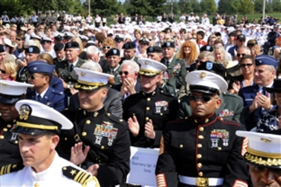 Several hundred troops and civilians gather during the opening ceremony of the Medal of Honor Convention at Soldier Field, Chicago, Sept 15, 2009.
