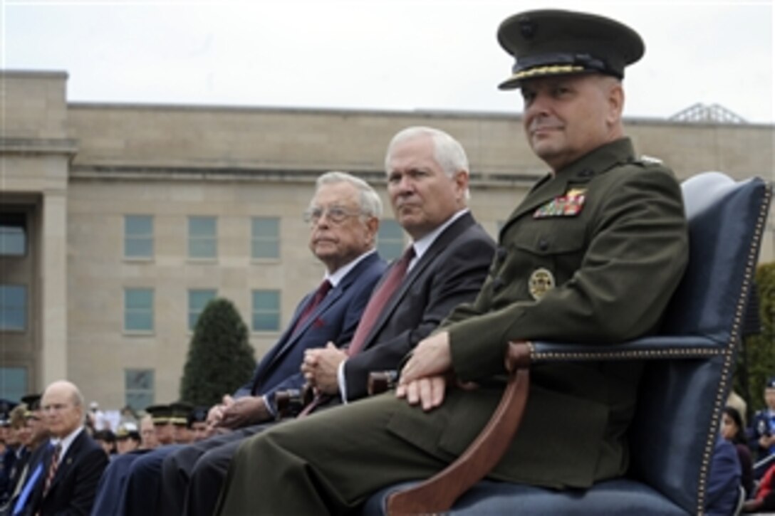 Retired rear admiral Jeremiah A. Denton Jr. (left), Secretary of Defense Robert M. Gates and Vice Chairman of the Joint Chiefs of Staff Gen. James E. Cartwright (right) attend the National POW/MIA Recognition Day Ceremony at the Pentagon on Sept. 18, 2009.  