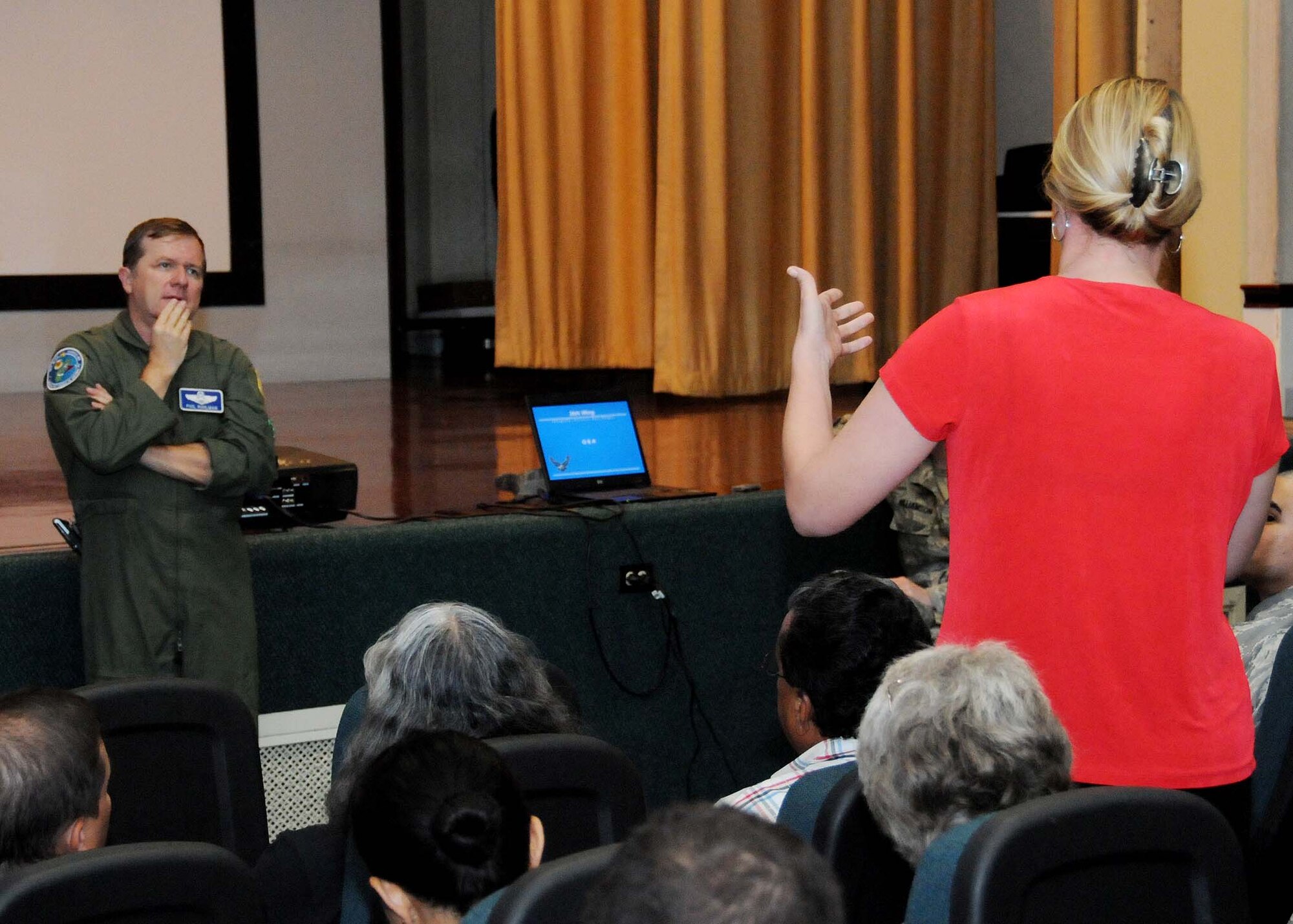 ANDERSEN AIR FORCE BASE, Guam - Maj. Cynthia Pouncey, 36th Medical Operations Squadron, asks base officials to examine the quality of lawn care at the newly renovated track during a town hall meeting here Sept. 17. She noted that the grass is covering the track in several areas. (U.S. Air Force photo by Senior Airman Nichelle Anderson) 