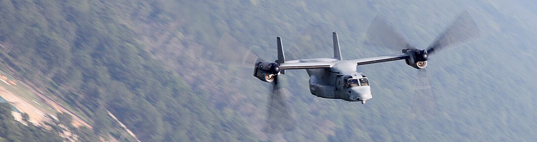 An Marine Medium Tiltrotor Squadron 266 MV-22B Osprey flies above Marine Corps Air Station New River, N.C., Aug. 10, 2011. The visit was hosted by Marine Medium Tiltrotor Squadron 266 for the 26th MEU Command Element to get a better understanding of the 26th MEU's future Aviation Combat Element's capabilities. (U.S. Marine Corps photo by Cpl. Christopher Stone/Released)