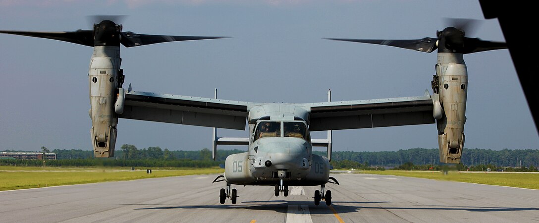 An MV-22B Osprey carrying 26th Marine Expeditionary Unit Marines and sailors lands at Marine Corps Air Station New River, N.C., Aug. 10, 2011. The visit was hosted by Marine Medium Tiltrotor Squadron 266 for the 26th MEU Command Element to get a better understanding of the 26th MEU's future Aviation Combat Element's capabilities. (U.S. Marine Corps photo by Cpl. Christopher Stone/Released)
