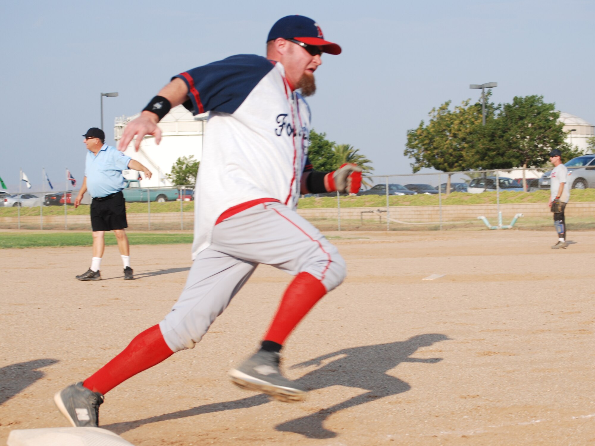 Security Forces beat Fire Department 10 to 9