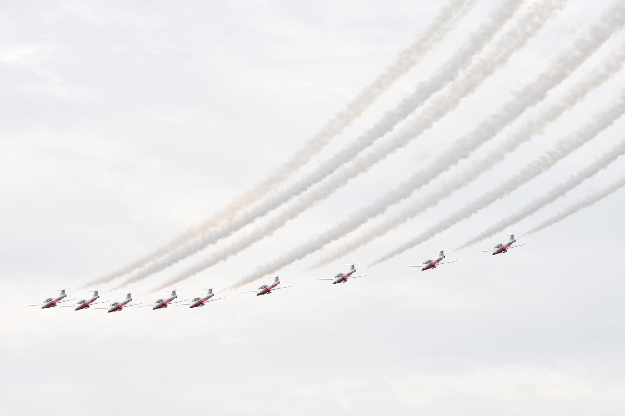 SCOTT AFB, Ill. -- The Canadian Forces Snowbirds complete a nine-ship formation loop during the Airpower Over the Midwest Airshow Saturday. The Snowbirds consist of 11 pilots. 
(U.S. Air Force photo by Senior Airman Teresa M. Hawkins)