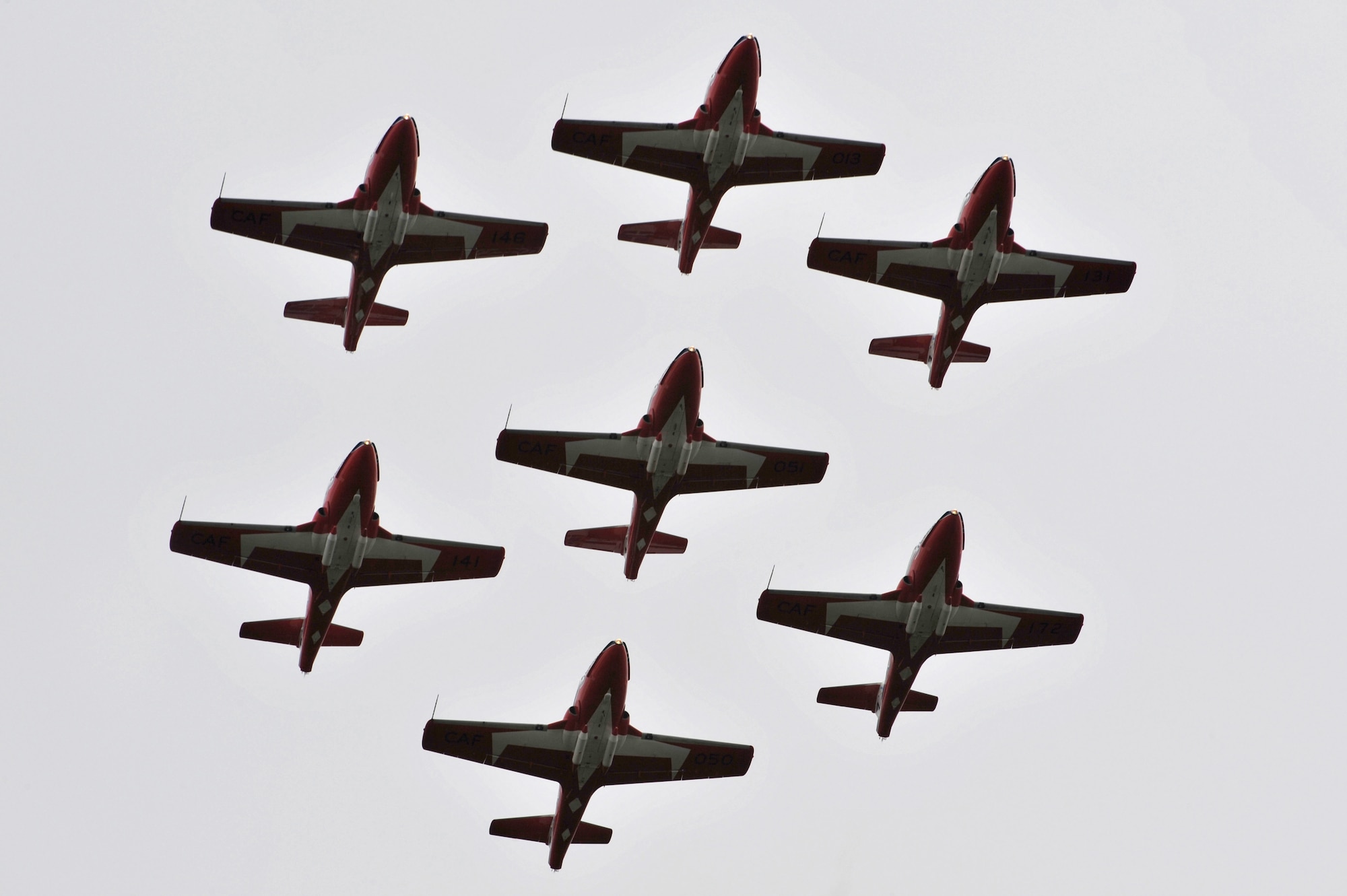 SCOTT AFB, Ill. -- The Canadian Forces Snowbirds form a tight seven-ship formation flight during the Airpower Over the Midwest Airshow Saturday. The Snowbirds represent the Canadian forces which fight alongside American troops at home and overseas. (U.S. Air Force photo by Senior Airman Teresa M. Hawkins)