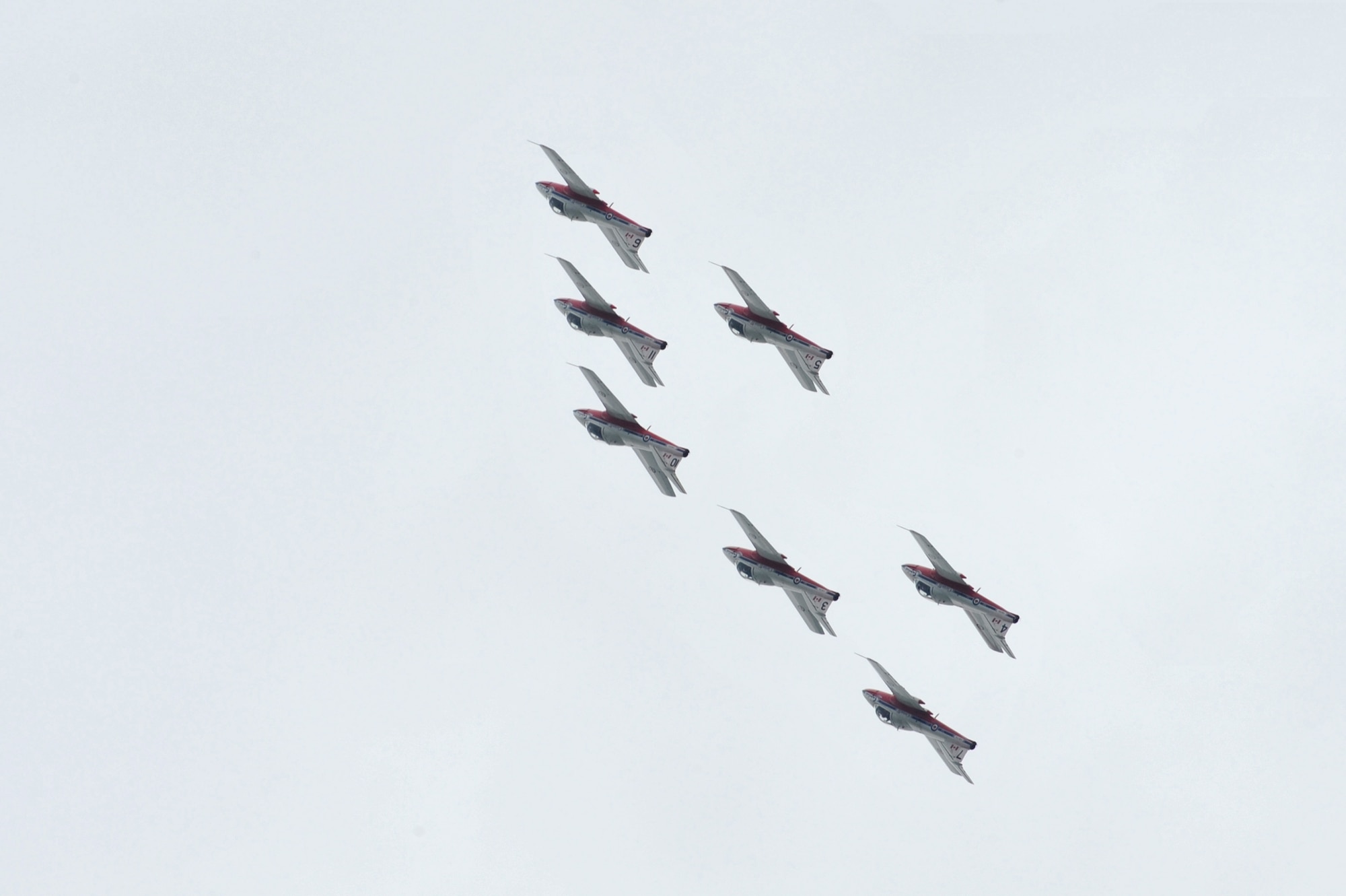 SCOTT AFB, Ill. -- The Canadian Forces Snowbirds perform a seven-ship formation loop during the Airpower Over the Midwest Airshow Saturday. The Snowbirds fly the CT-114 Tutor jet. (U.S. Air Force photo by Senior Airman Teresa M. Hawkins)