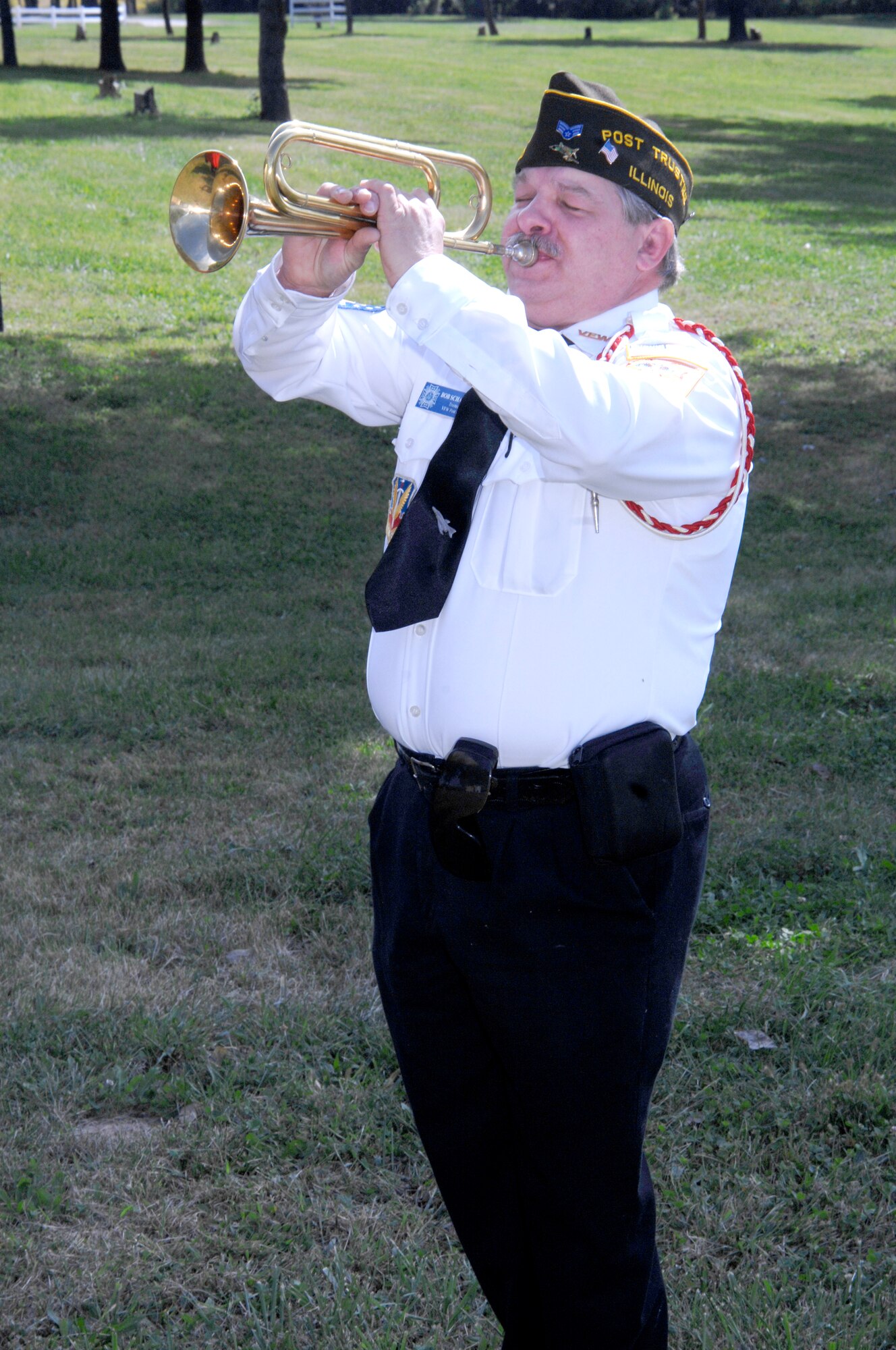 SCOTT AIR FORCE BASE, Ill. -- Bob Schaefer from the Polish American War Veterans plays Taps on the bugle in memory of those who have not yet returned during the 18th annual POW/MIA Recognition Ceremony at Freedom Farm, Freeburg, Ill. Past and present servicemembers and their families came together in hops that all those missing are set free or discovered and identified.

(U.S. Air Force photo/Airman 1st Class Amber Kelly-Herard)
