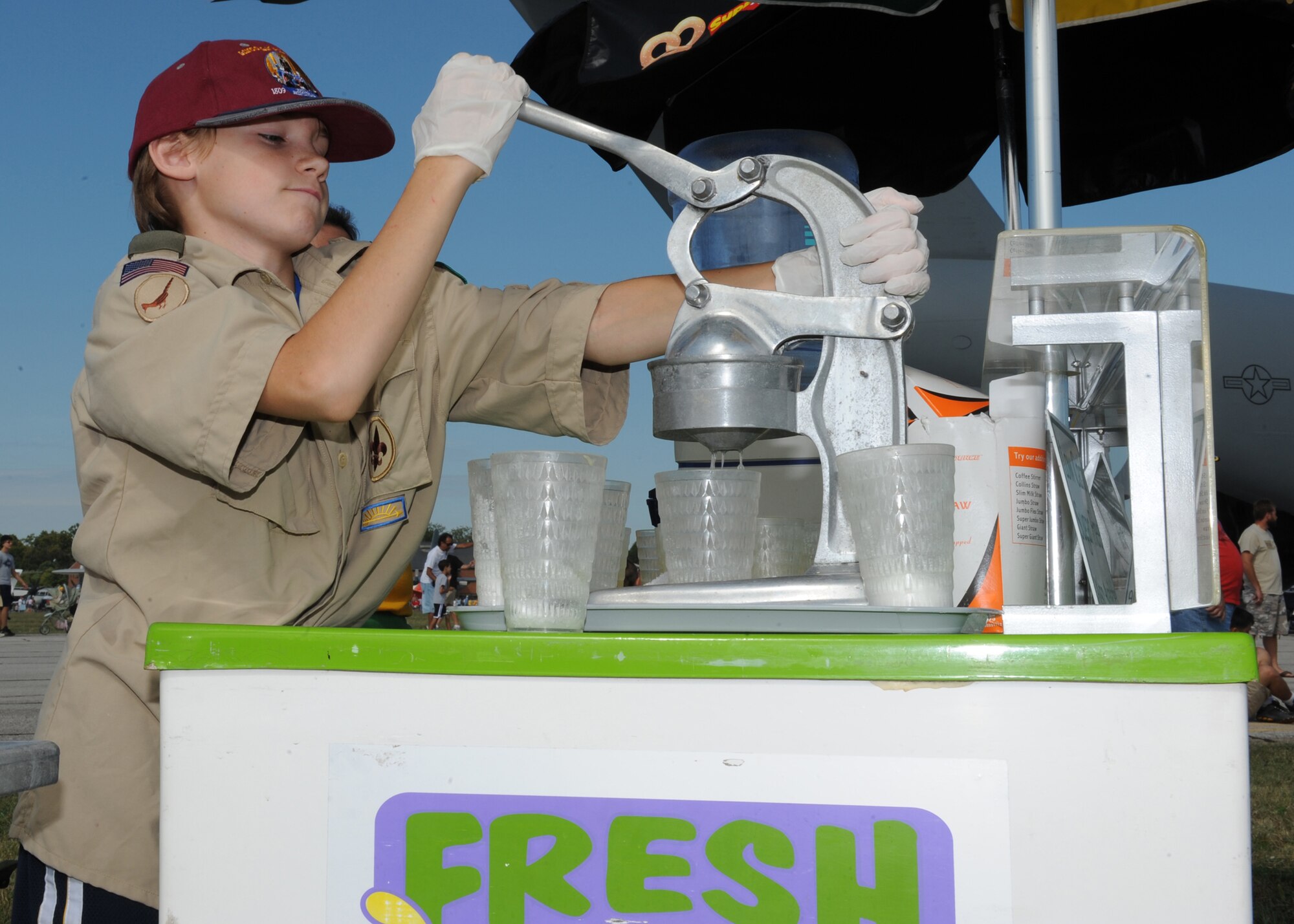 SCOTT AIR FORCE BASE, Ill. -- Mitchel Sanker from Boy Scout Troop 5 prepares lemonade during the Airpower Over the Midwest Airshow at Scott. More than 60,000 people attended the show Sept. 19. (U.S. Air Force photo/Tech. Sgt. Michelle R. Larche)