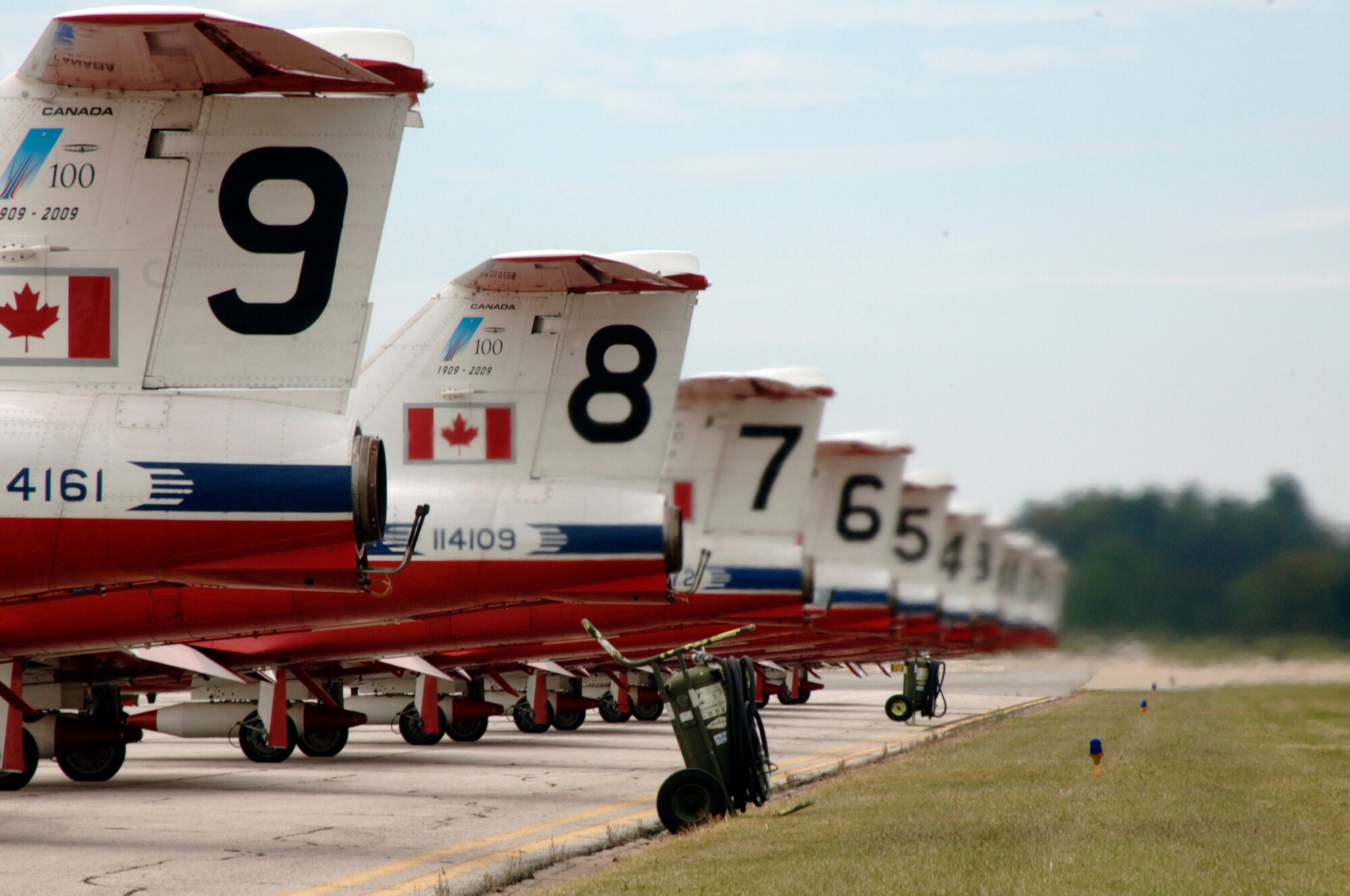 SCOTT AIR FORCE BASE, Ill. -- Canadian Snowbirds pilots start their jet engines in preparation for their aerial demonstration during the 2009 Airpower Over the Midwest Airshow held at Scott Air Force Base,Ill., from Sept. 19-20.  Their pilots and technicians work as a team to bring thrilling performances to the North American public.  Serving as Canadian ambassadors, the Snowbirds demonstrate the high level of professionalism, teamwork, excellence, discipline and dedication inherent in the women and men of the Air Force and the Canadian forces. (U.S. Air Force photo/Master Sgt. Dave DeRemer) 