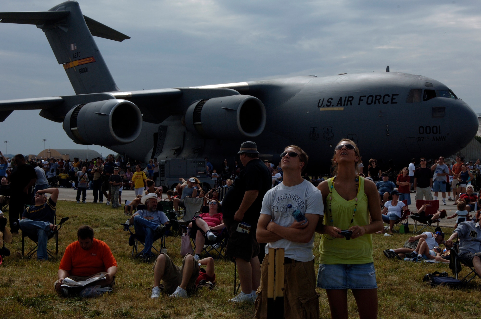 SCOTT AIR FORCE BASE, Ill. -- Spectators watch as the Canadian Snowbirds perform an aerial demonstration during the 2009 Airpower Over the Midwest Airshow held at Scott Air Force Base, Ill., from Sept. 19-20.  The airshow featured the Canadian Snowbirds, the Armys Golden Knights, TORA! TORA! TORA!  and various other aerial demonstrations and static displays.   (U.S. Air Force photo/Master Sgt. Dave DeRemer)