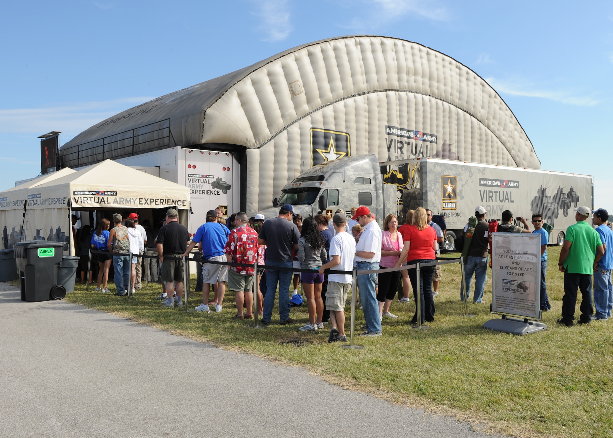 SCOTT AIR FORCE BASE, Ill. -- Members of Team Scott along with people from surrounding communities wait in line to participate in the U.S. Army virtual experience at the Air Power over the Midwest air show held at Scott on Saturday. The virtual experience gives those who participate a glimpse at what it's like to be a Soldier in the U.S. Army. (U.S. Air Force photo/Airman 1st Class Wesley P. Farnsworth)