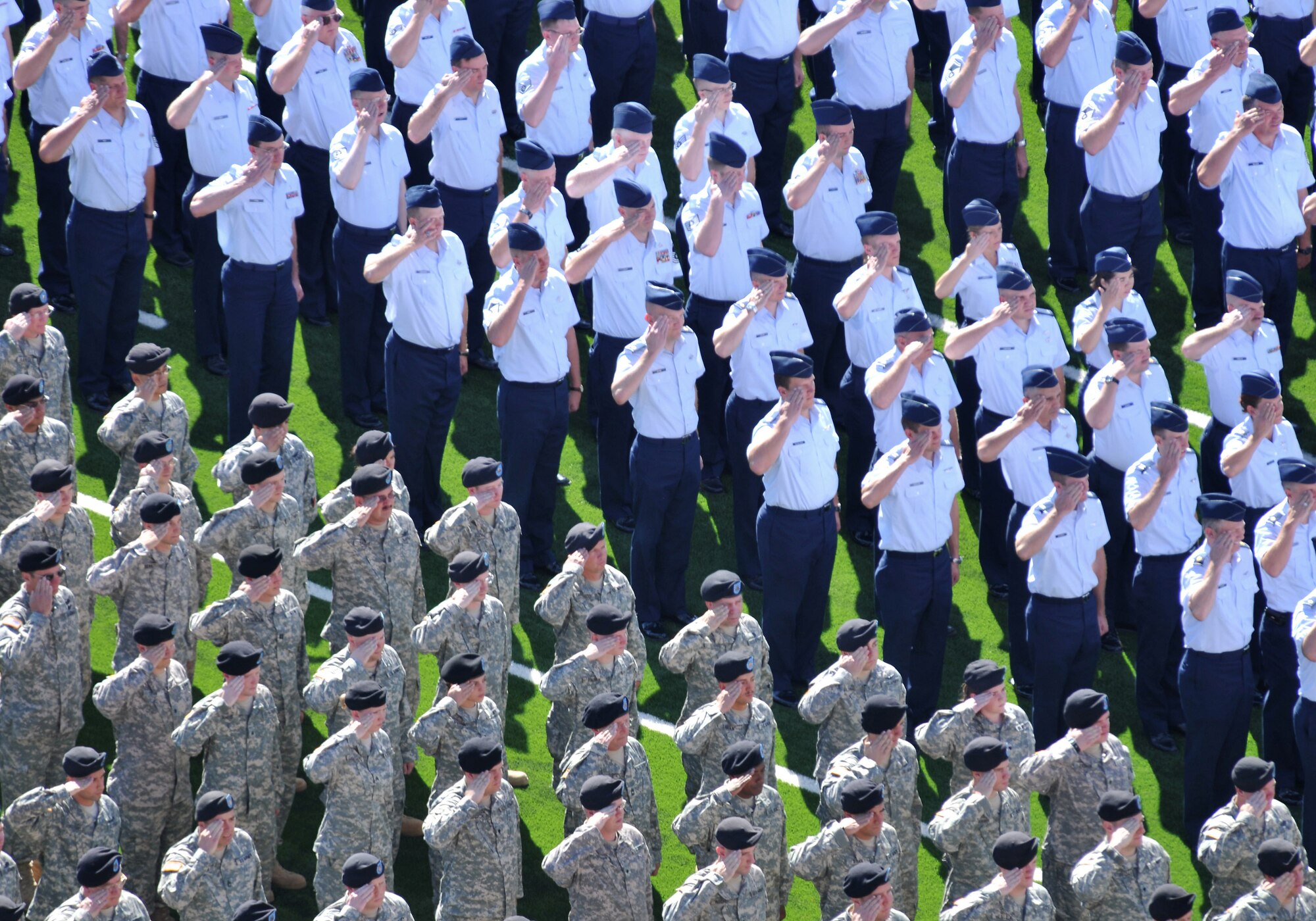 Members of the Utah Army and Air National Guard stand in formation during the annual Governor's day event September 19.  Utah Governor Gary Herbert reviewed the Airmen and Soldiers during a parade pass and review. The last two years the event has taken place at the University of Utah's Rice-Eccles Stadium. 
U.S. Photo by Tech Sgt Michael D Evans


