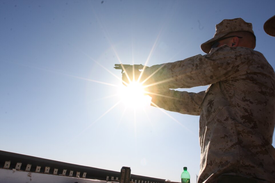 Cpl. Dustin Miner, an anti-tank missileman with Weapons Company, 1st Battalion, 7th Marine Regiment, fires off a shot during pistol qualification at the Combat Center's pistol range Sept. 22. More opportunities to practice their marksmanship skills are available to Marines through the Commanding General's Intramural Rifle and Pistol Competition here Sept. 28 to Oct. 16.