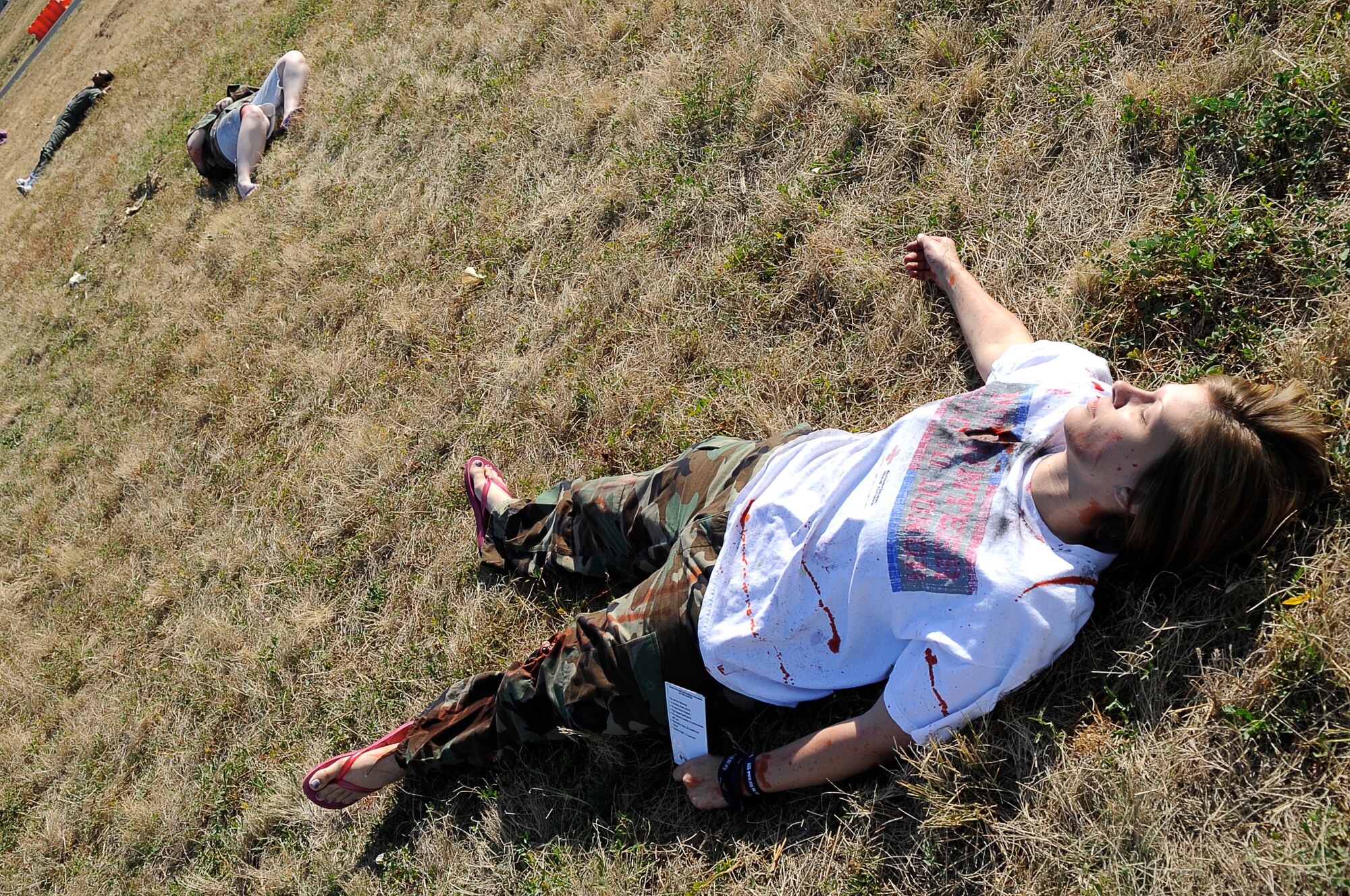 Volunteers play victims of a car bomb in support of a Medical Emergency Response Capability Assessment and Training Sept. 18 at Buckley Air Force Base. The MERCAT is designed to test home station medical capabilities. (U.S. Air Force Photo by: Tech. Sgt. Jeromy K. Cross)