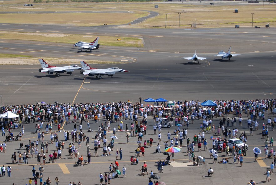 HICKAM AIR FORCE BASE, Hawaii -- Six Thunderbirds, U.S. Air Force Air Demonstration Squadron, taxi out before take off to begin their demonstration during the Open House, "Wings over the Pacific," here, Sep. 20. The Open House featured live band performances, static displays and The Thunderbirds demonstrated the capabilities of the F-16 Fighting Falcon when they preformed combat maneuvers at the air show. (U.S. Air Force photo/Senior Airman Gustavo Gonzalez)