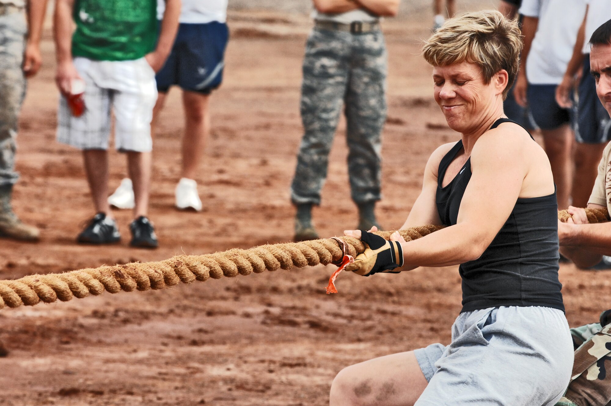 HOLLOMAN AIR FORCE BASE, N.M. -- Maj. Marlyce Roth, 49th Communications Squadron commander, competes in the tug of war event during the Wing Sports Day at the Domenici Fitness and Sports Center here Sept. 18. Members from 16 squadrons competed in a variety of sports while spectators observed and rooted for their colleagues during the morale-boosting event.. (U.S. Air Force photo by Staff Sgt. Anthony Nelson Jr.)