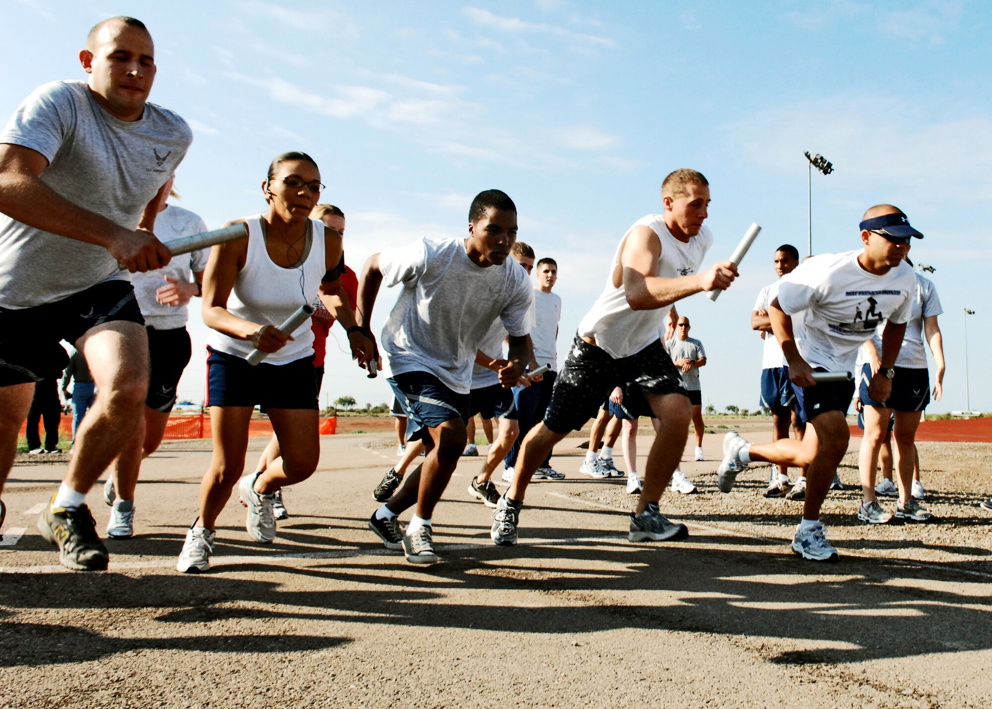 HOLLOMAN AIR FORCE BASE, N.M. -- Runners from Team Holloman begin the three-mile relay on Sports Day at the Domenici Fitness and Sports Center here Sept. 18. The winners of each event were split into large and small units and two squadrons walked away with the Sports Day 2009 trophy. The 49th Civil Engineer Squadron won for large units and the 49th Force Support Squadron won for small units. (U.S. Air Force photo by Staff Sgt. Anthony Nelson Jr.)
