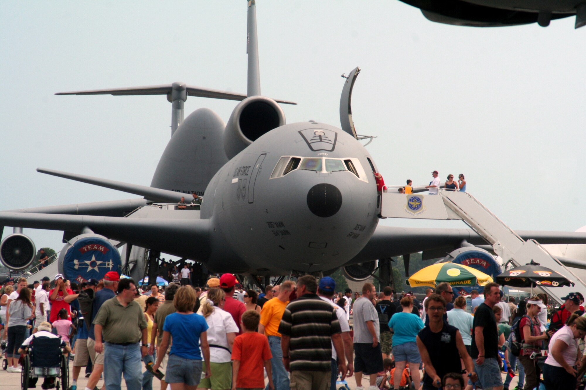 Attendees to the 2009 Scott Air Force Base Airshow look at a static display version of a KC-10 Extender from Joint Base McGuire-Dix-Lakehurst, N.J., on Sept. 19, 2009, at Scott AFB, Ill.  The airshow drew tens of thousands of people and featured a wide variety of aircraft on static display and in aerial performances.  (U.S. Air Force Photo/Tech. Sgt. Scott T. Sturkol)