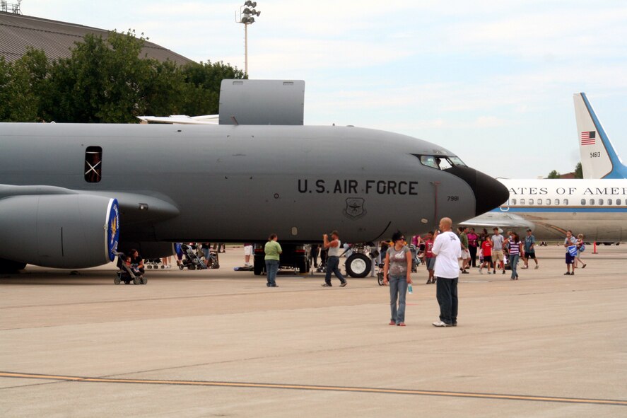 Attendees to the 2009 Scott Air Force Base Airshow look at static displays on Sept. 19, 2009, at Scott AFB, Ill.  The airshow drew tens of thousands of people and featured a wide variety of aircraft on static display and in aerial performances.  (U.S. Air Force Photo/Tech. Sgt. Scott T. Sturkol)