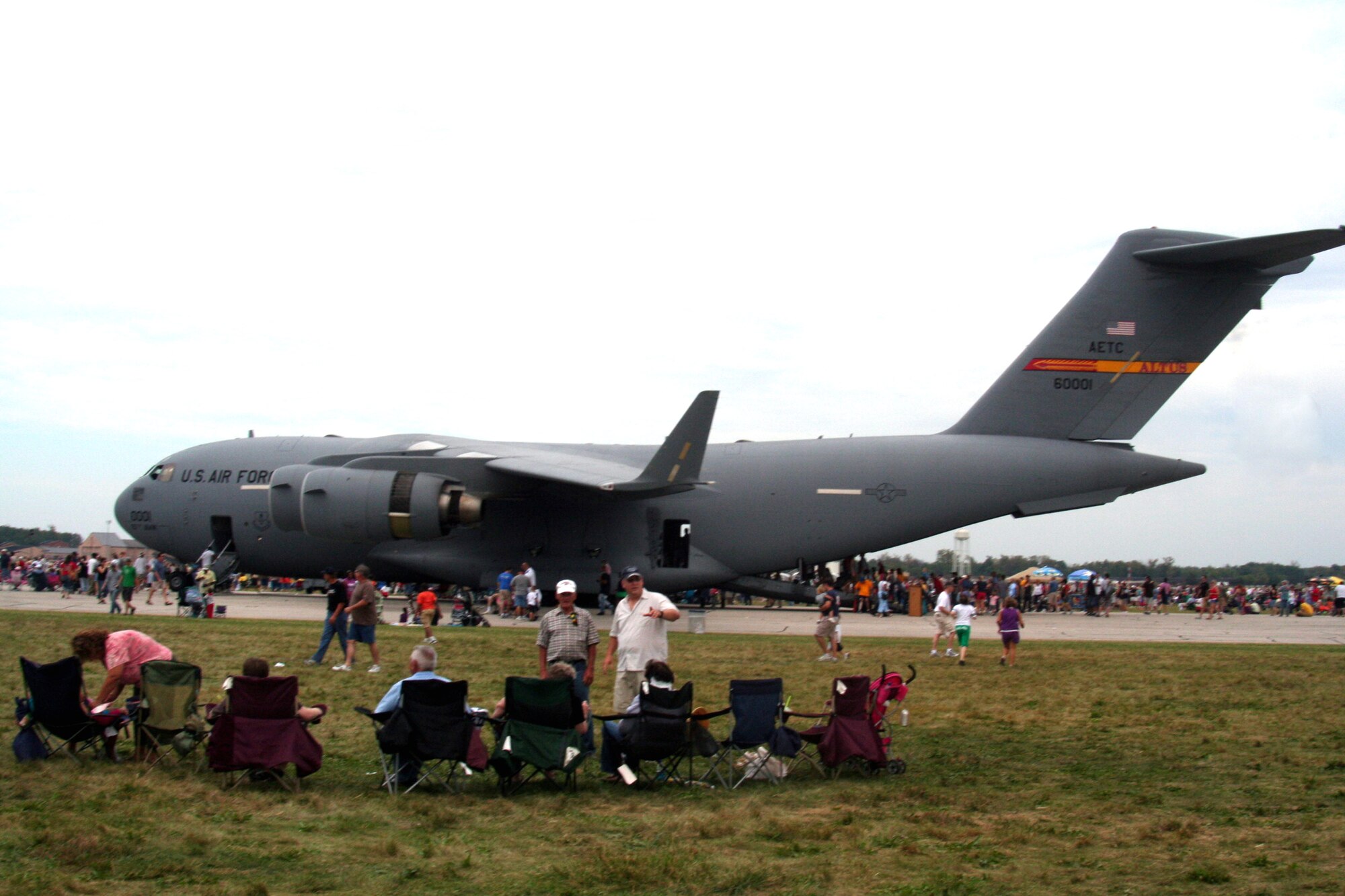 Attendees to the 2009 Scott Air Force Base Airshow look at a static display of a C-17 Globemaster III on Sept. 19, 2009, at Scott AFB, Ill.  The airshow drew tens of thousands of people and featured a wide variety of aircraft on static display and in aerial performances.  (U.S. Air Force Photo/Tech. Sgt. Scott T. Sturkol)