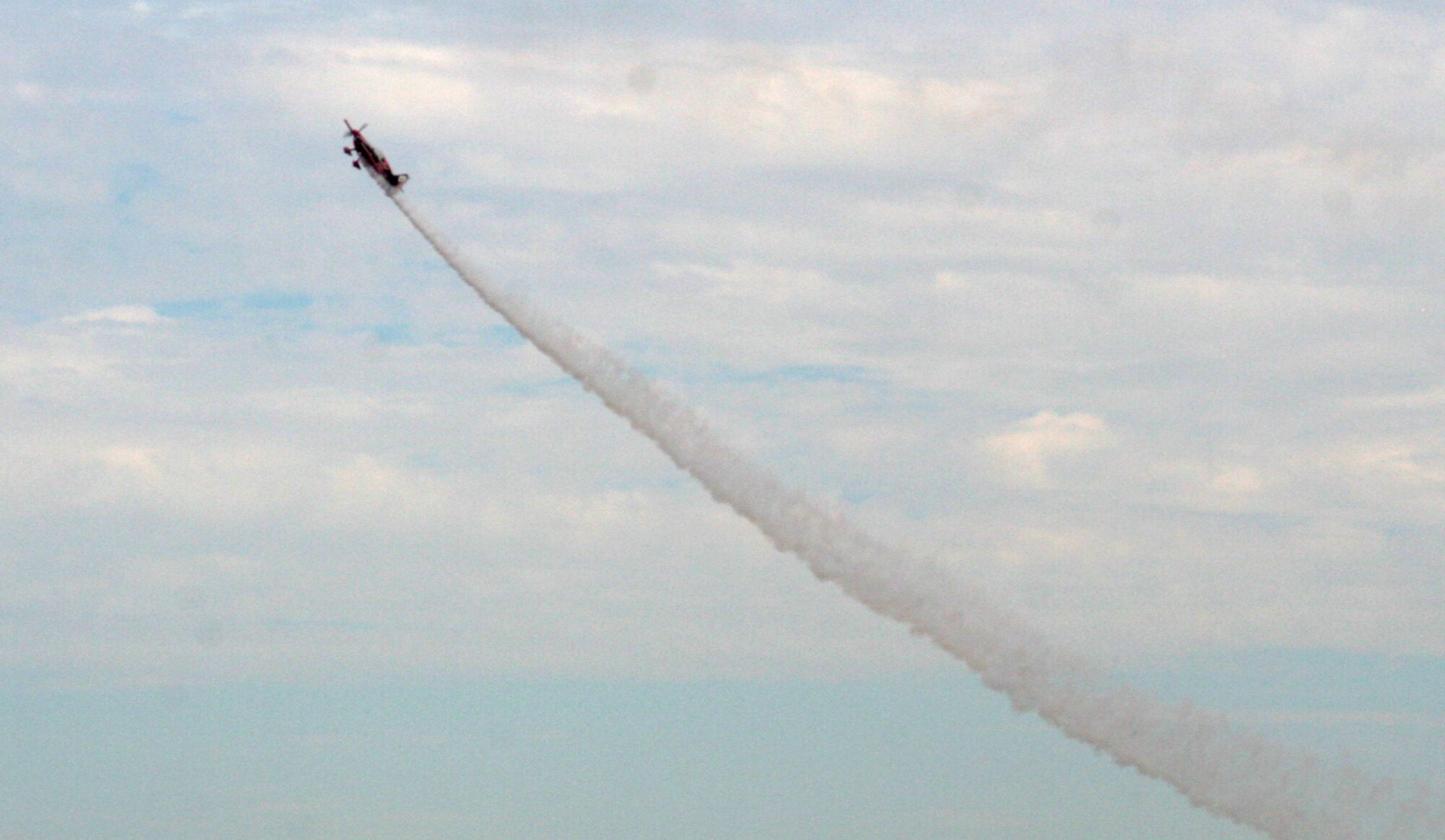 A propeller-driven aircraft performs an aerial manuever during the 2009 Scott Air Force Base Airshow on Sept. 19, 2009, at Scott AFB, Ill.  The airshow drew tens of thousands of people and featured a wide variety of aircraft on static display and in aerial performances.  (U.S. Air Force Photo/Tech. Sgt. Scott T. Sturkol)