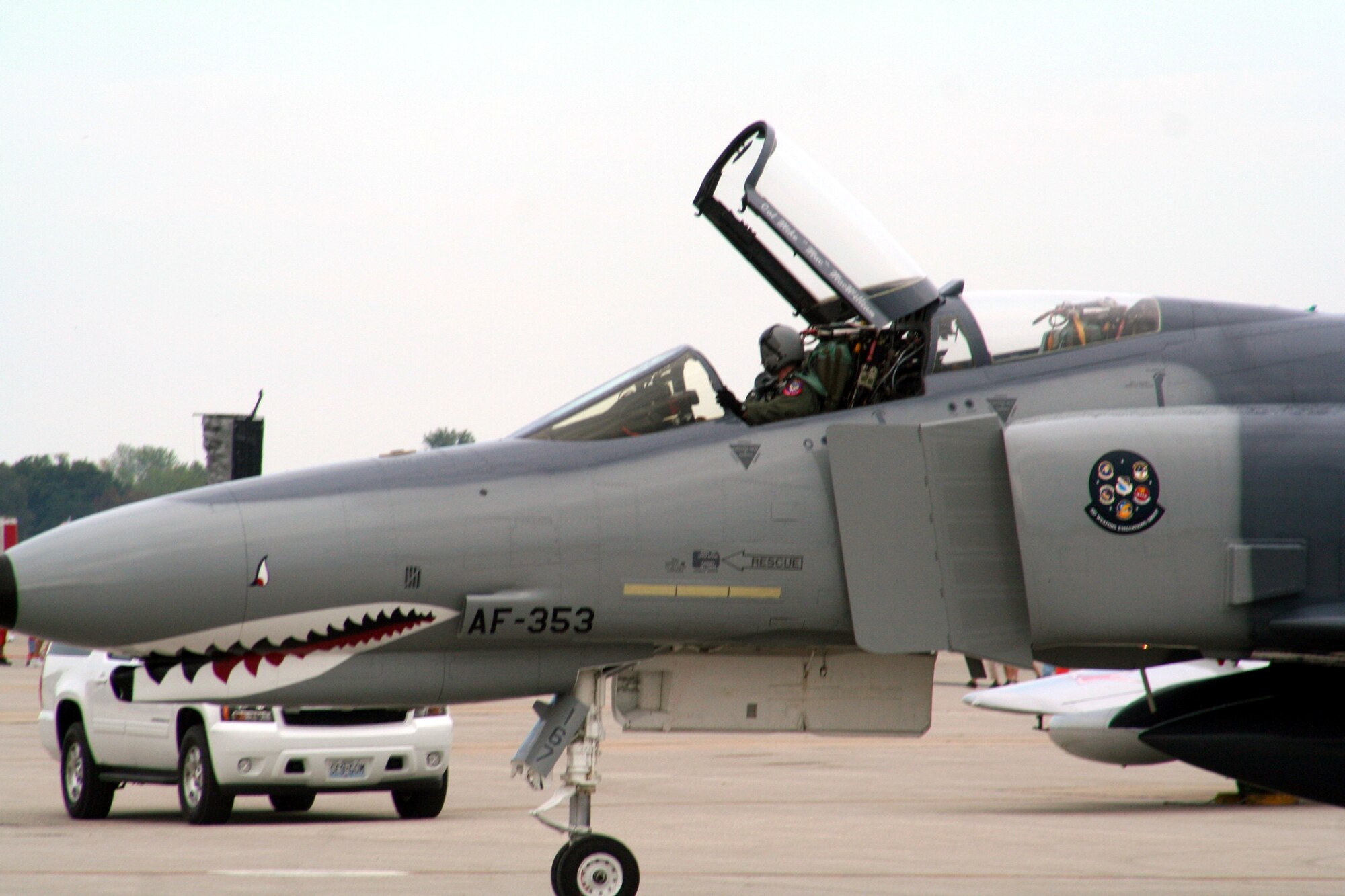 A pilot steers a vintage F-4 Phantom II aircraft to a parking area after completing and aerial demonstration during the 2009 Scott Air Force Base Airshow on Sept. 19, 2009, at Scott AFB, Ill.  The airshow drew tens of thousands of people and featured a wide variety of aircraft on static display and in aerial performances.  (U.S. Air Force Photo/Tech. Sgt. Scott T. Sturkol)