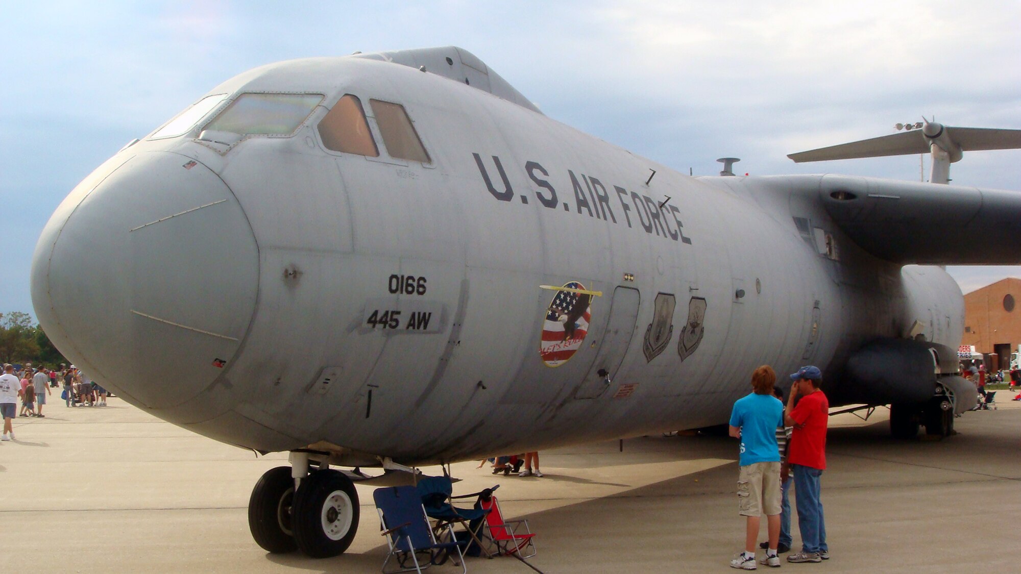 Attendees to the 2009 Scott Air Force Base Airshow look at a static display version of a C-141 Starlifter on Sept. 19, 2009, at Scott AFB, Ill.  The airshow drew tens of thousands of people and featured a wide variety of aircraft on static display and in aerial performances.  (U.S. Air Force Photo/Tech. Sgt. Scott T. Sturkol)