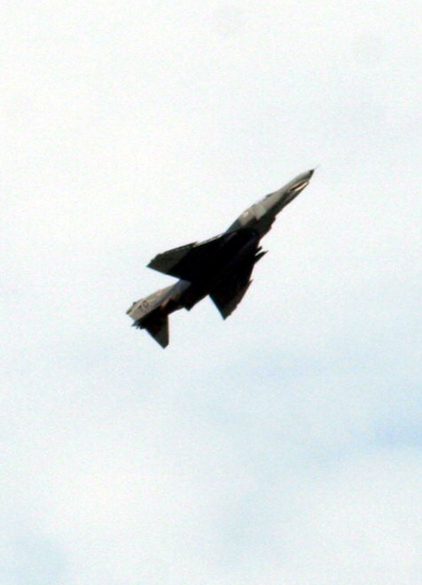 A vintage F-4 Phantom II aircraft performs a maneuver during the 2009 Scott Air Force Base Airshow on Sept. 19, 2009, at Scott AFB, Ill.  The airshow drew tens of thousands of people and featured a wide variety of aircraft on static display and in aerial performances.  (U.S. Air Force Photo/Tech. Sgt. Scott T. Sturkol)
