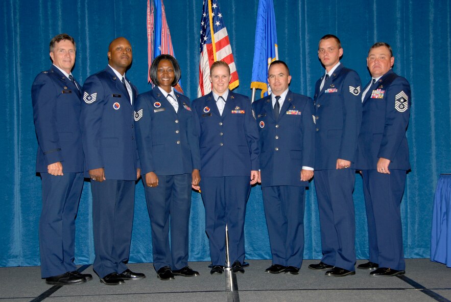 McGHEE TYSON AIR NATIONAL GUARD BASE, Tenn. -- The commander of the I.G. Brown Air National Guard Training and Education and the instructors for Airman Leadership School Class 09-5 gather for the presentation of diplomas during the class graduation ceremony at Wilson Hall here, Sept. 10, 2009.  Pictured from L-R are Col Richard B. Howard and Airman Leadership School instructors, Tech. Sgt. Robert Perry, Tech. Sgt. Jeela Matthews, Tech. Sgt. Deanloy Arriola, Tech. Sgt. Matt Grumbach, Tech. Sgt. Adam Thornton, and Chief Master Sgt. James B. Long, guest speaker .  (U.S. Air Force photo by Master Sgt. Kurt Skoglund)