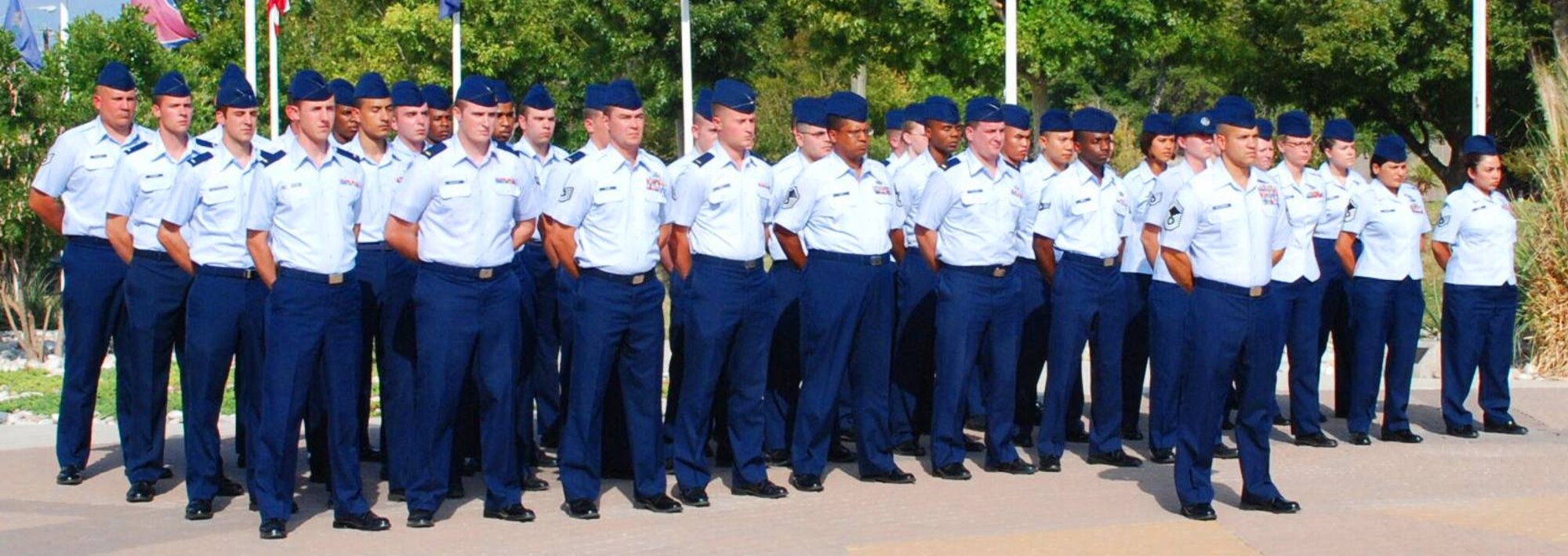 LAUGHLIN AIR FORCE BASE, Texas -- A formation of Airmen commanded by Senior Master Sgt. John Maldonado, 47th Installation Support Squadron, stands ready to participate in the POW/MIA Recognition ceremony here Sept. 18. The ceremony was held in observance of National POW/MIA Remembrance Day, which is held the third Friday in September as a way to remember former American prisoners of war and those still missing in action. (U.S. Air Force photo by Airman 1st Class Blake Mize)