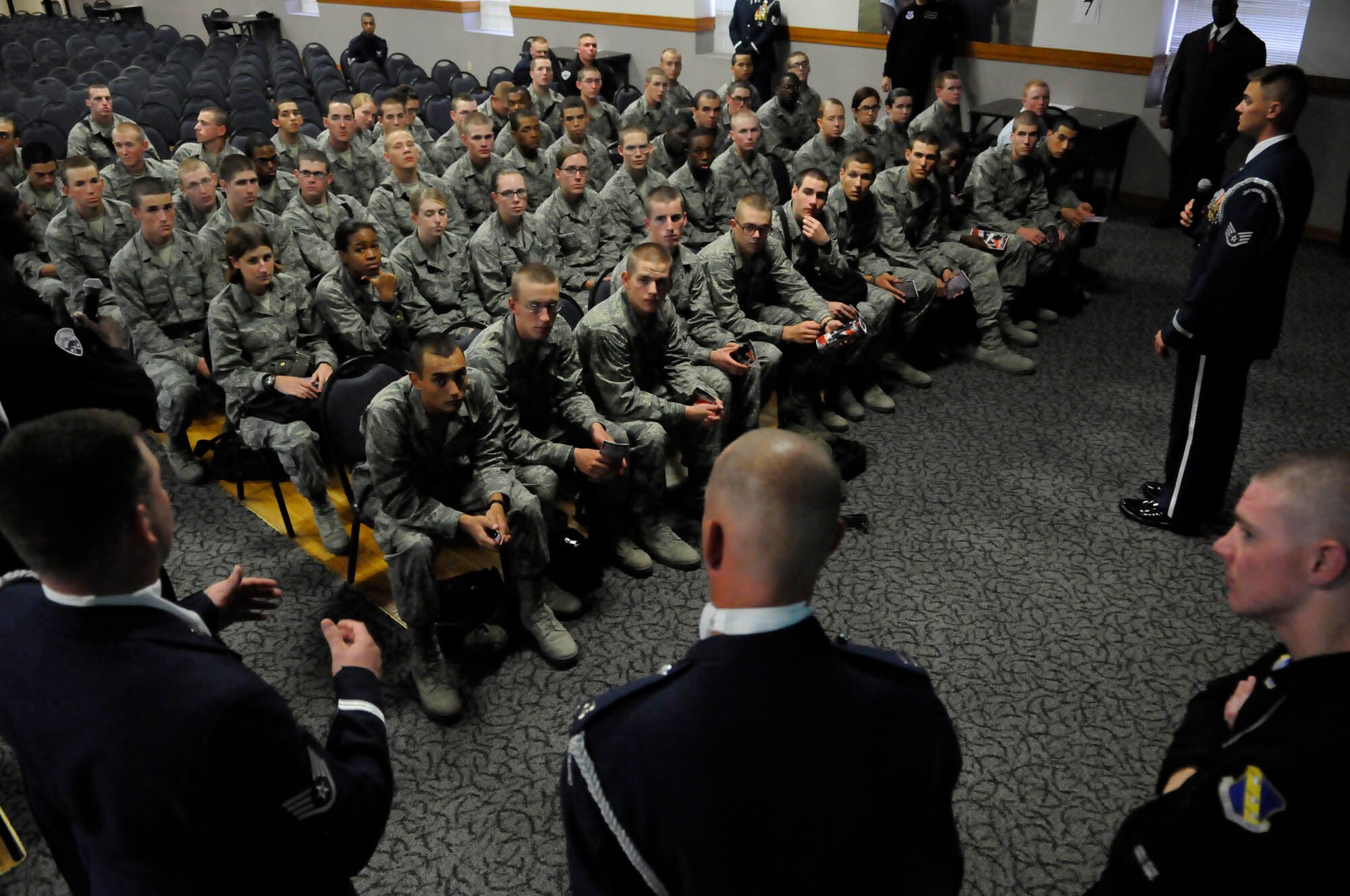 Members of the United States Honor Guard Drill Team and the Honor Guard Recruiting Section answer questions from basic trainees about the Honor Guard Sept. 19 at Lackland Air Force Base, Texas.  The Drill Team along with members of the Honor Guard’s recruiting section travel to Lackland every other month in order to recruit new members into the Honor Guard. (U.S. Air Force photo by Staff Sgt. Dan DeCook)