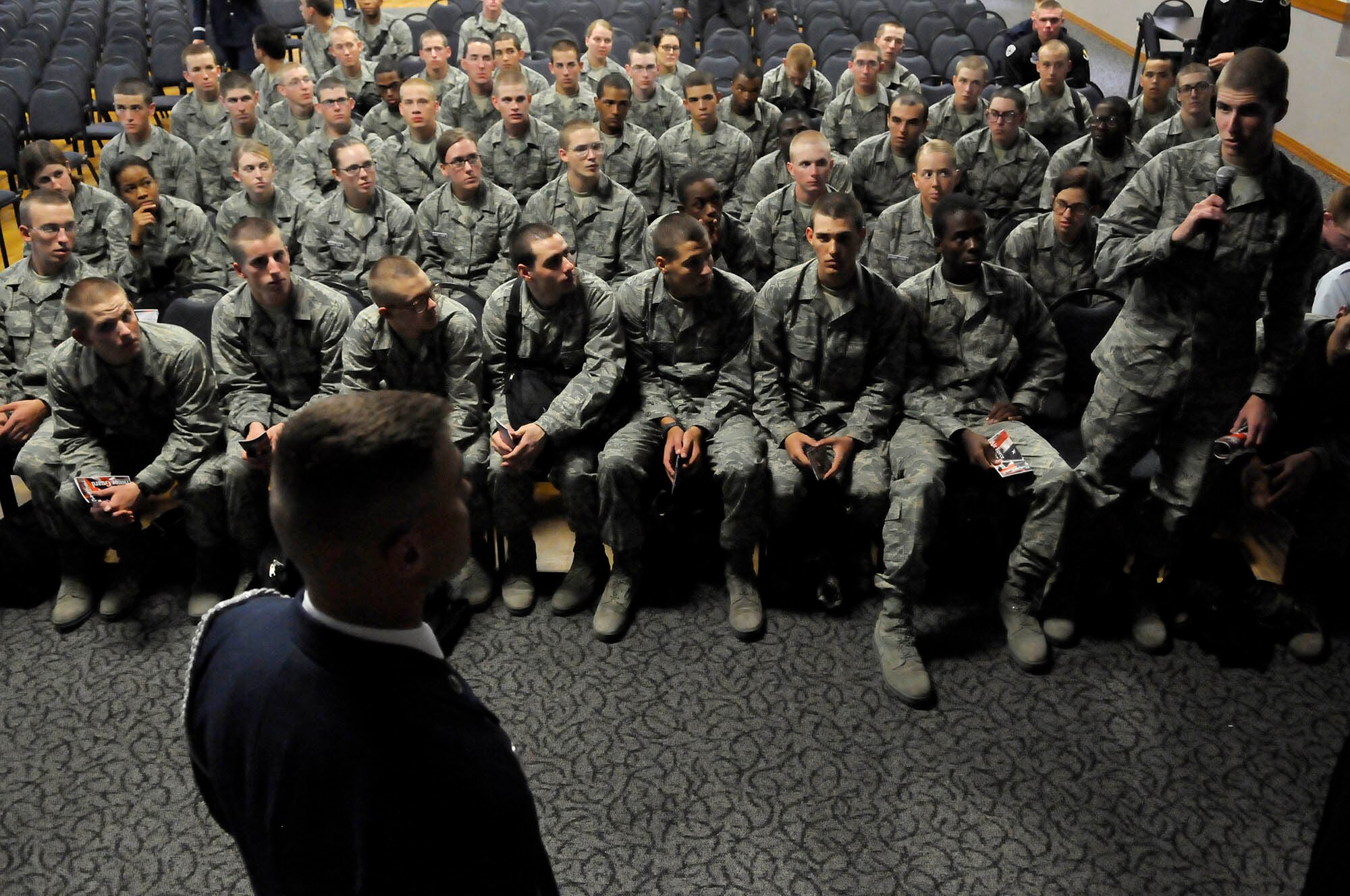 Staff Sgt. Alex Frizzo, non-commissioned officer in charge of United States Air Force Honor Guard recruiting, answers questions from basic trainees about the Honor Guard Sept .19 at Lackland Air Force Base, Texas.  The Drill Team along with members of the Honor Guard’s recruiting section travel to Lackland every other month in order to recruit new members into the Honor Guard. (U.S. Air Force photo by Staff Sgt. Dan DeCook)