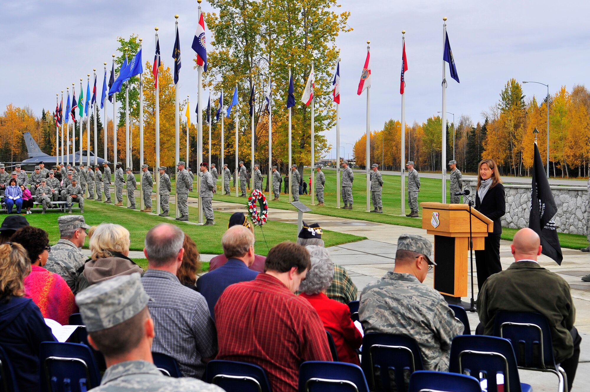 Melissa Stepovich delivers the Governors' proclamation during the Prisoners of War/Missing in Action ceremony Sept. 18, 2009, Eielson Air Force Base, Alaska. The POW/MIA ceremony pays tribute to those who were captured or have gone missing during war. Since World War I, over 296,800 Americans have been classified as POW/MIA. Mrs. Stepovich is Director of the Fairbanks office of the Governor. (U.S. Air Force photo/Staff Sgt. Christopher Boitz)