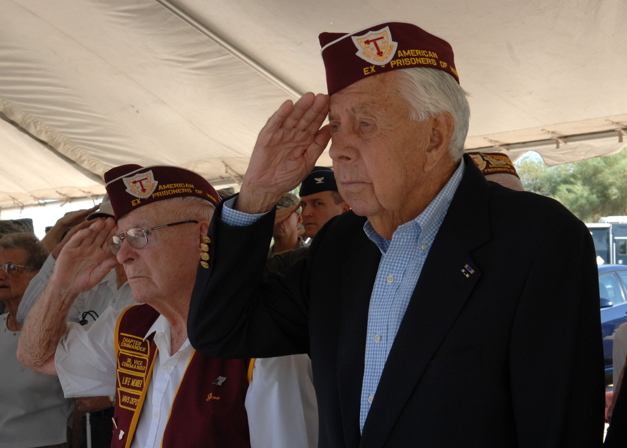 Veterans of World War II and ex-POWs salute during the national anthem Sept. 18 while attending POW-MIA recognition day at Heritage Park. 

The United States’ national POW/MIA recognition day is observed anually on the third Friday of September. Many Americans take the time to remember those who were prisoners of war (POW) and those who are missing in action (MIA), as well as their families. (U.S. Air Force Photo/Airman 1st Class Jerilyn Quintanilla)