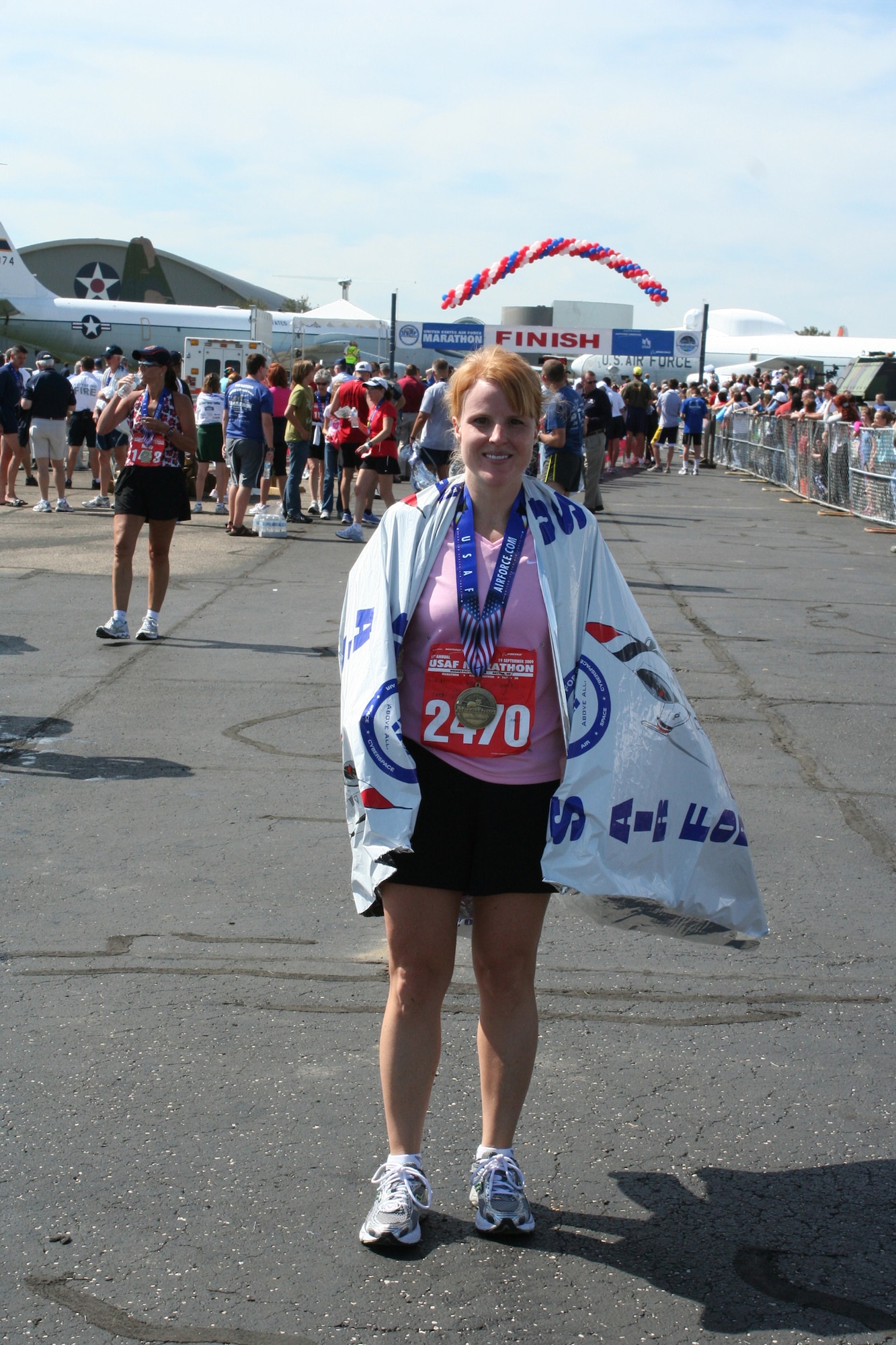 WRIGHT-PATTERSON AIR FORCE BASE, Ohio - Master Sgt. Rebecca Spencer, 445th Logistics Readiness Squadron, recovers shortly after completing the 13th annual United States Air Force Marathon at Wright-Patterson Air Force Base, Ohio, Sept. 19. Sergeant Spencer completed the race with 2,013 other men and women finishing 811th over all with a time of 4 hours, 15 minutes. (U. S. Air Force photo/Capt. Rodney McNany)