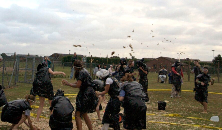 RAF ALCONBURY, United Kindom - Students from the Department of Defense Dependent School system at Alconbury participate in the annual "Muckfest". The Muckfest is a giant food fight for the students. The program was put on by the base chapel.