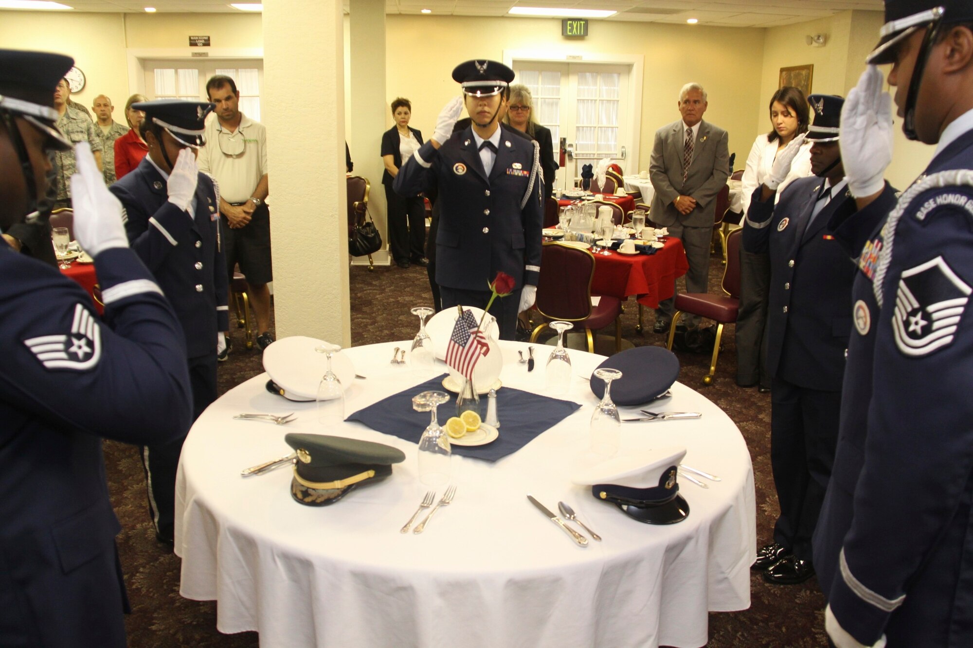 The Homestead Air Reserve Base Honor Guard performs a ceremony that honored the POW/MIA's who were not able to attend. 