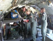 Members of the 34th Aeromedical Evacuation Squadron attend to a simulated patient during the 2009 Air Mobility Command RODEO competition July 27-31 at McChord Air Force Base, Wash. The members of the unit went head-to-head with other AES's in the Air Force and from other countries. The 34th AES took second place overall in their competition category. (Courtesy photo)