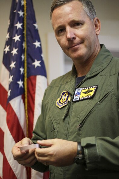Brig. Gen. William Binger, the 482nd Fighter Wing commander, shows his remembrance bracelt in honor of Navy Lt. Cmdr. Michael S. Spiecher who was shot down flying a combat mission in an F/A-18 Hornet over West-Central Iraq on Jan. 17, 1991 during Operation Desert Storm. Spiecher was repatriated in August. 