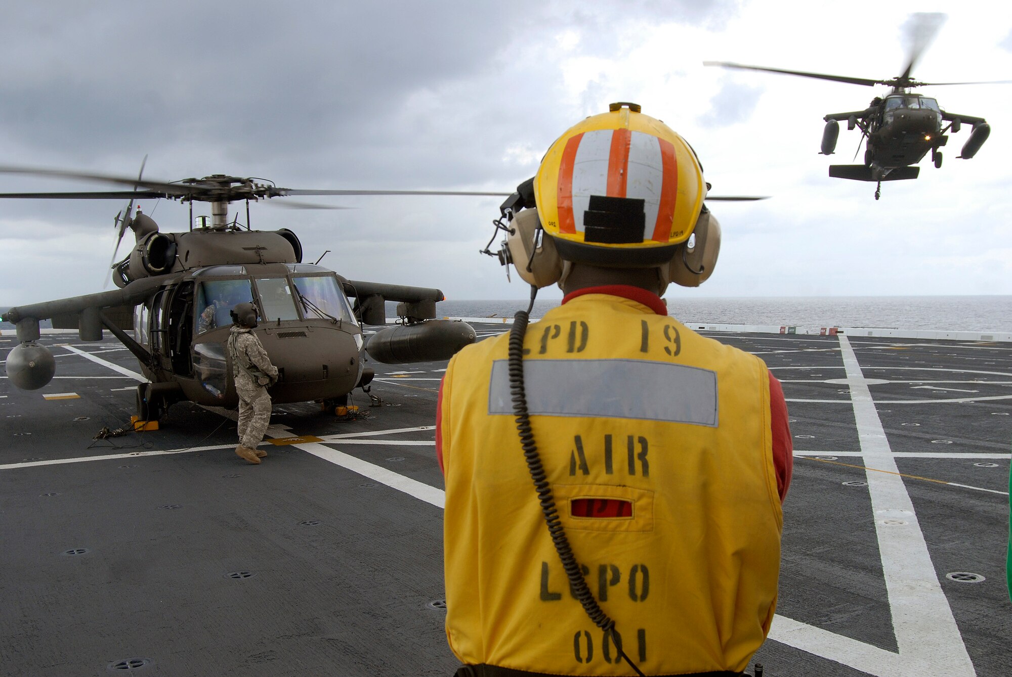 USS MESA VERDE, Gulf of Mexico — Another Army UH-60 Blackhawk helicopter, assigned with Joint Task Force-Bravo, prepares to land on the flight deck during flight quarters aboard the amphibious dock transport ship USS Mesa Verde (LPD 19) Sept. 15. Mesa Verde is underway for Fuerzas Alidas (FA) PANAMAX 2009.  FA PANAMAX is an annual U.S. Southern Command joint and multi-national training exercise tailored to the defense of the Panama Canal, involving civil and military forces from around the world. (U.S. Navy photo/Mass Communication Specialist 3rd Class Patrick Grieco).