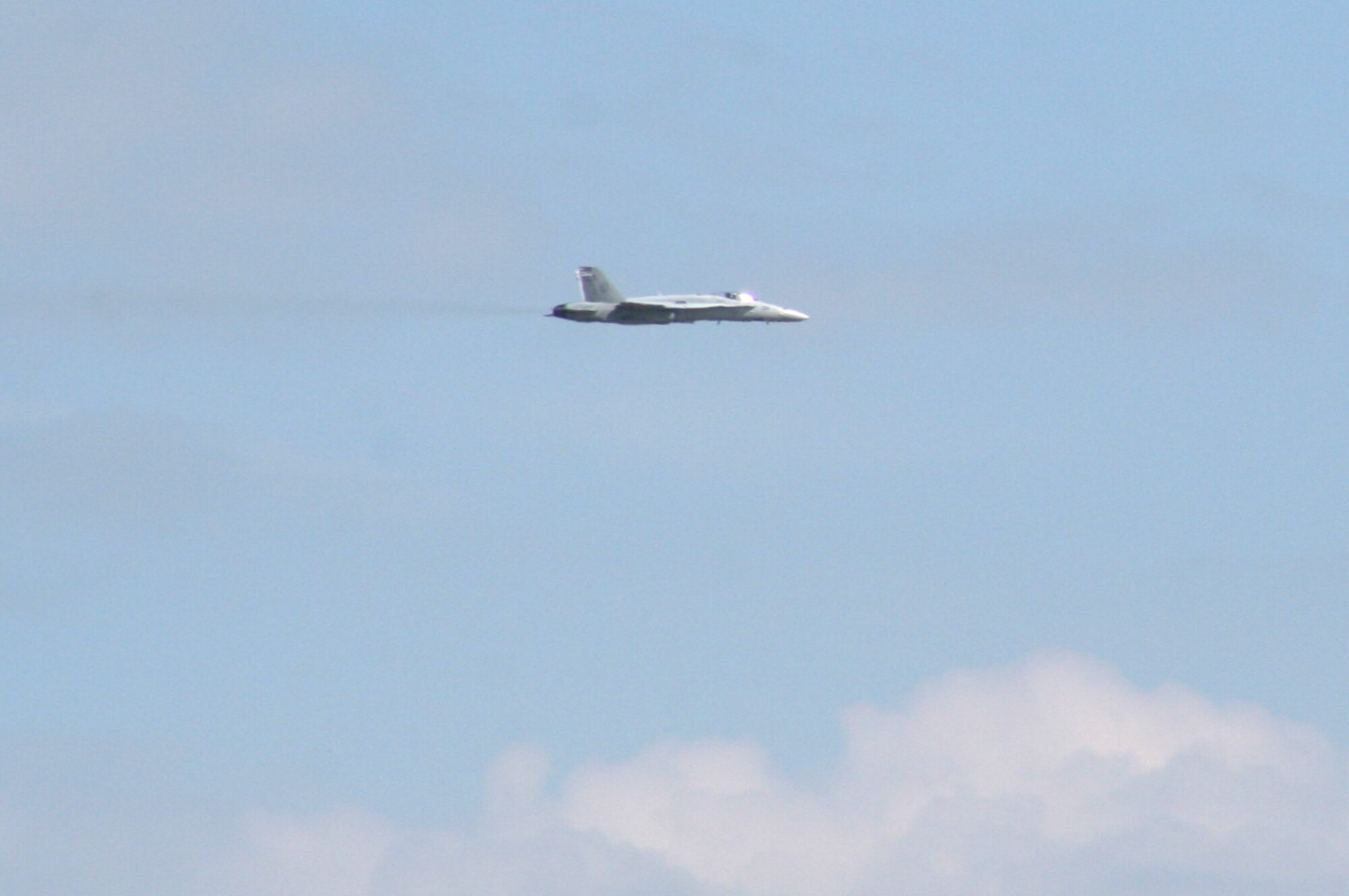 A U.S. Navy F-18 Hornet flies during a practice run for the 2009 Scott Air Force Base Airshow on Sept. 18, 2009, at Scott AFB, Ill.  The airshow took place from Sept. 19 and 20 drawing tens of thousands of people.  (U.S. Air Force Photo/Tech. Sgt. Scott T. Sturkol) 