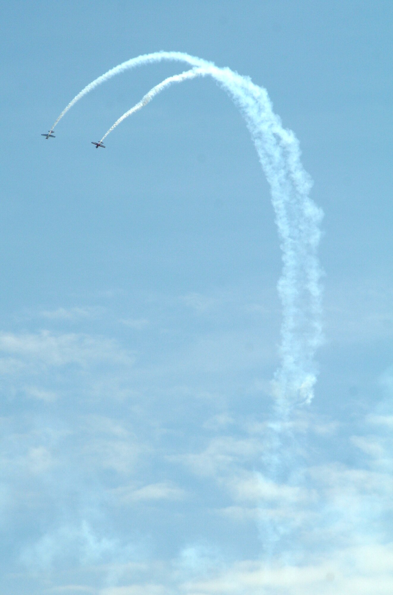 Propeller driven aircraft fly during a practice run for the 2009 Scott Air Force Base Airshow on Sept. 18, 2009, at Scott AFB, Ill.  The airshow took place from Sept. 19 and 20 drawing tens of thousands of people.  (U.S. Air Force Photo/Tech. Sgt. Scott T. Sturkol) 