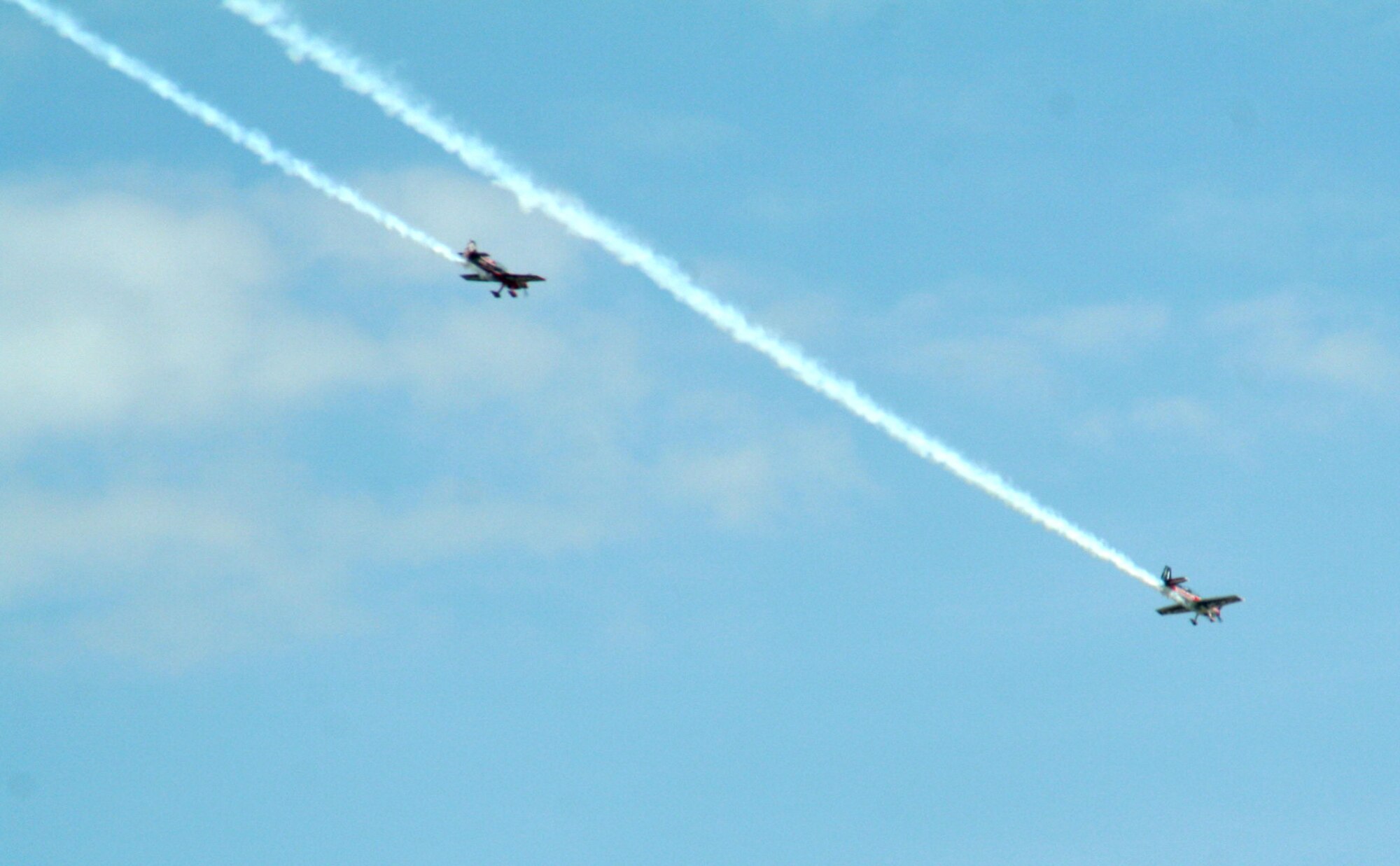 Propeller driven aircraft fly during a practice run for the 2009 Scott Air Force Base Airshow on Sept. 18, 2009, at Scott AFB, Ill.  The airshow took place from Sept. 19 and 20 drawing tens of thousands of people.  (U.S. Air Force Photo/Tech. Sgt. Scott T. Sturkol) 