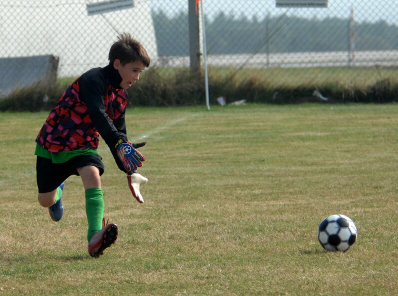 SPANGDAHLEM AIR BASE, Germany – Gator Brett Hayes, son of Capt. Thomas Hayes, 23rd Fighter Squadron, defends the goal during a 9- and 10-year-old youth soccer game here Sept. 19. The youth soccer league focuses on teaching fundamentals, positions and teamwork. The Gators defeated the Sabers 5-0 and now stand at 2-0 for the season.  (U.S. Air Force photo/Airman 1st Class Staci Miller)