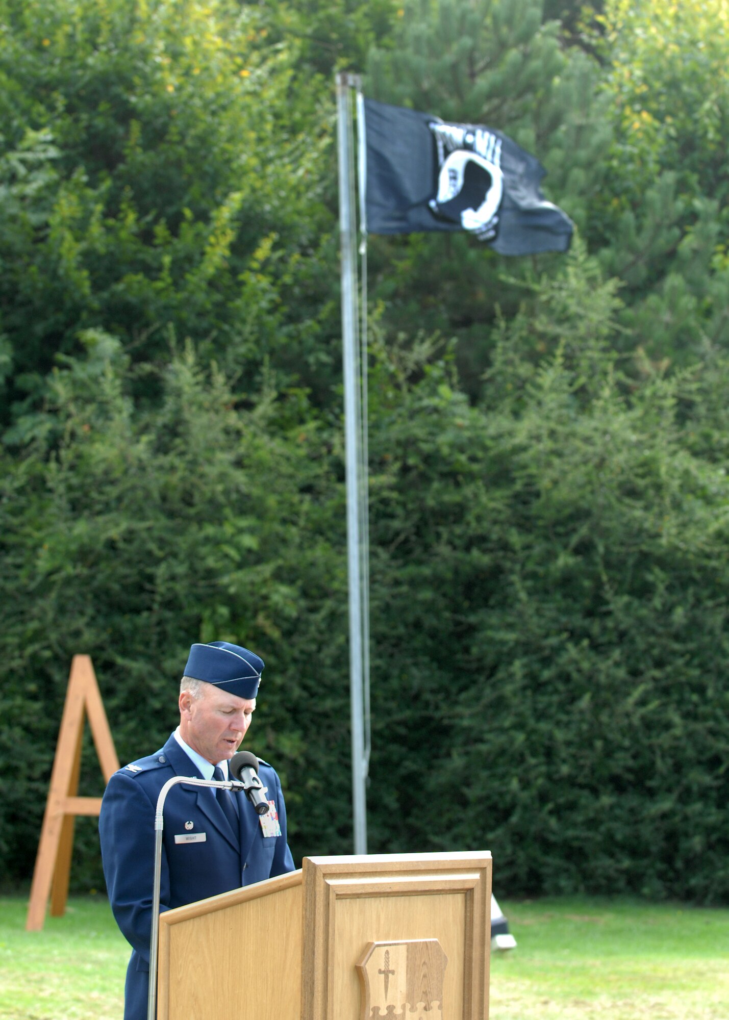 SPANGDAHLEM AIR BASE, Germany -- Col. Tip Wight, 52nd Fighter Wing commander, addresses members of the 52nd FW during the POW/MIA ceremony at the Air Park Sept. 18. The ceremony is held every year to remember those who have served and been taken prisoners of war or have been listed as missing in action.  (U.S. Air Force photo/Airman 1st Class Nathanael Callon)